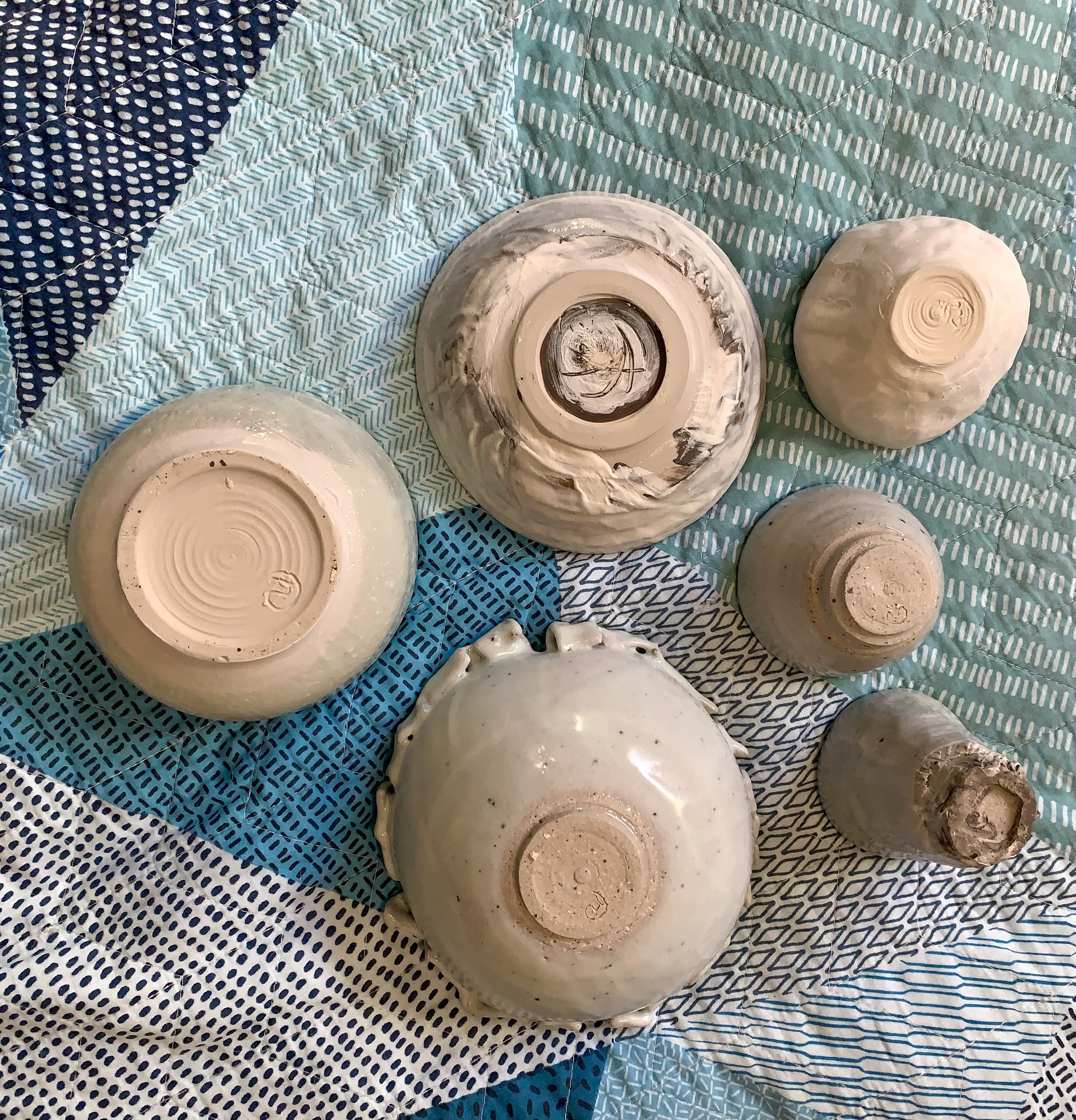 Collection of shino and ash glazed stoneware vessels