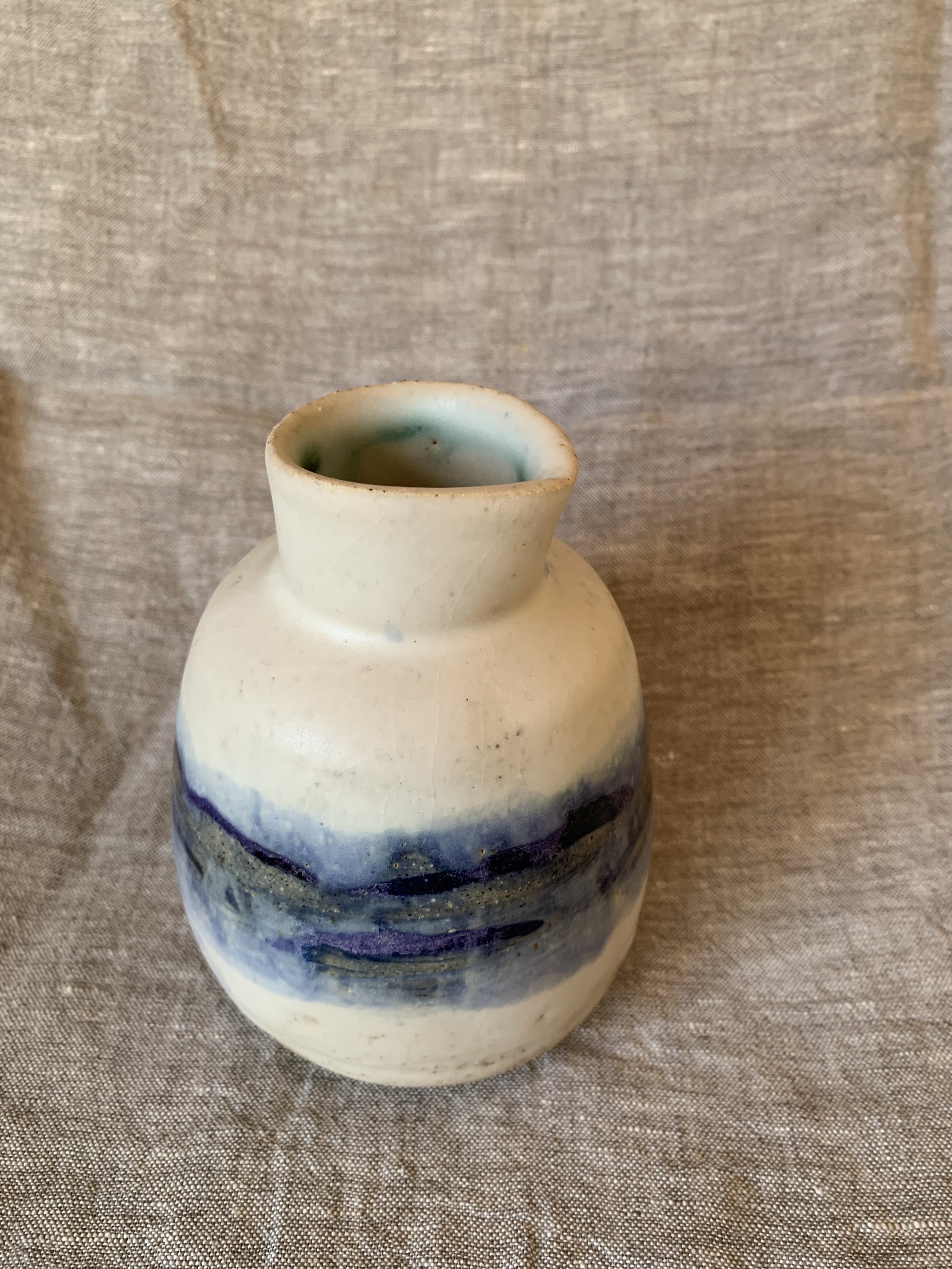 Bottle, stoneware with slips, oxides, and glaze.