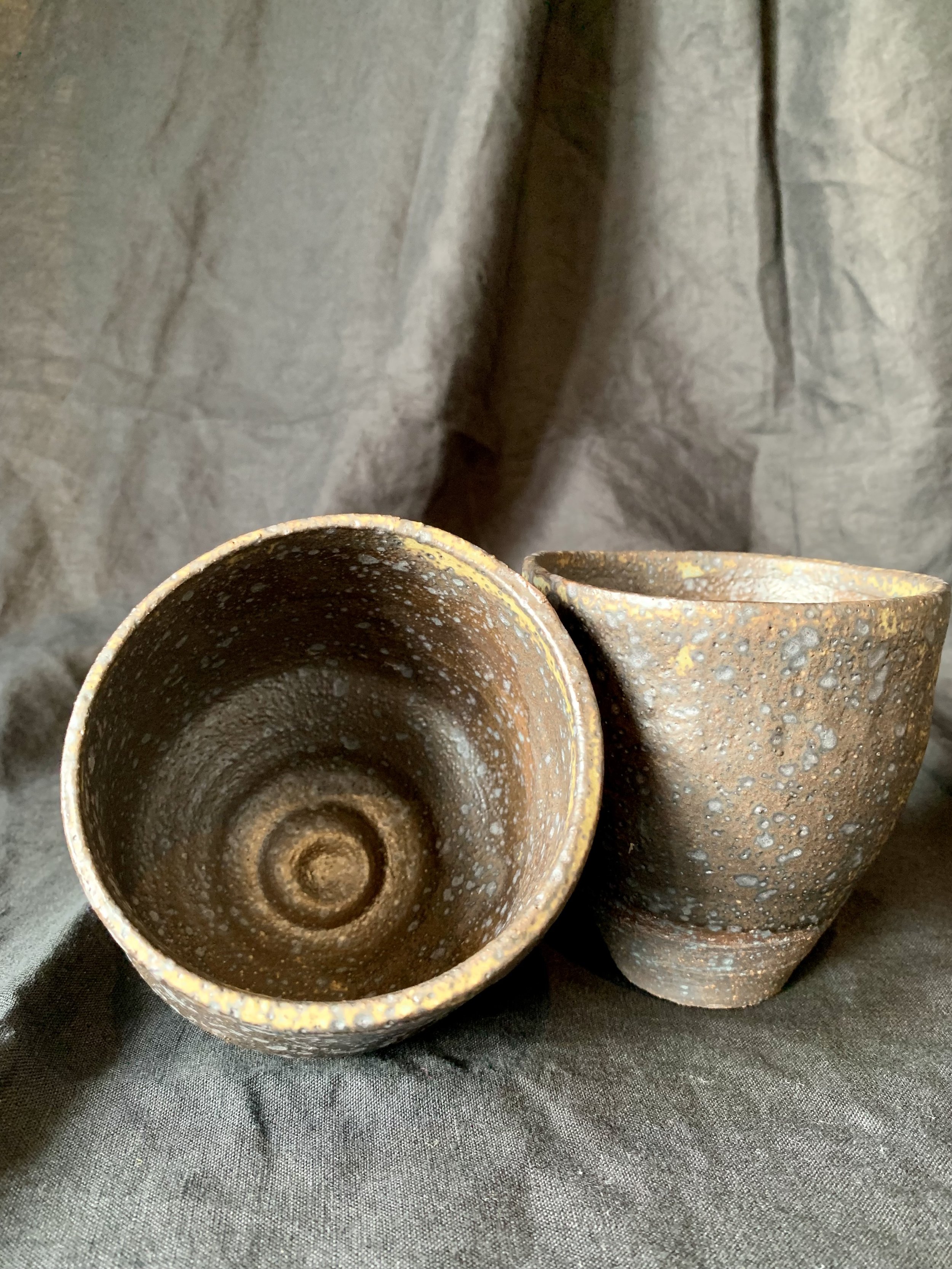 Two reduction fired stoneware cups