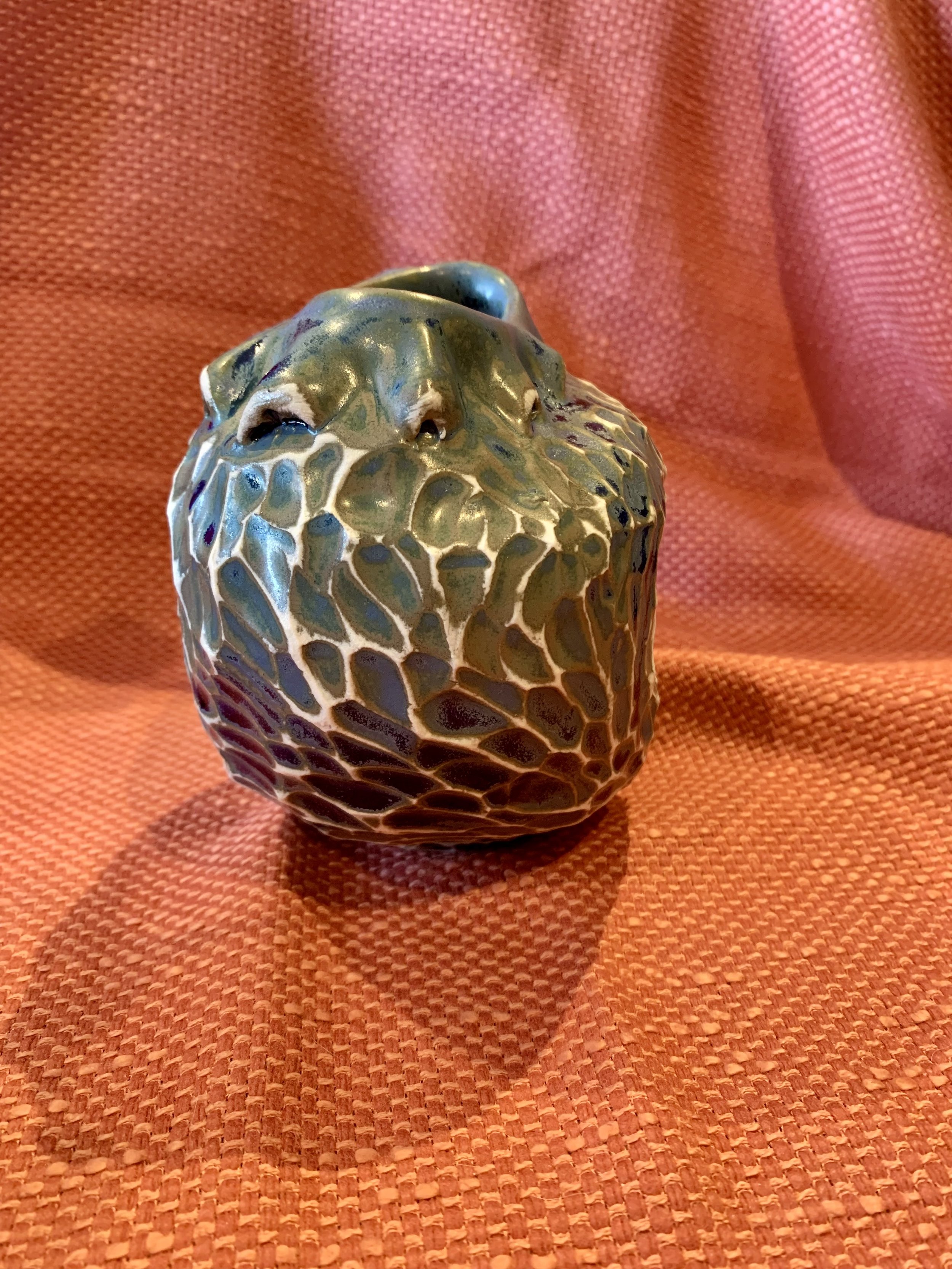 Frill necked and softly faceted thrown and altered vase, glazed stoneware
