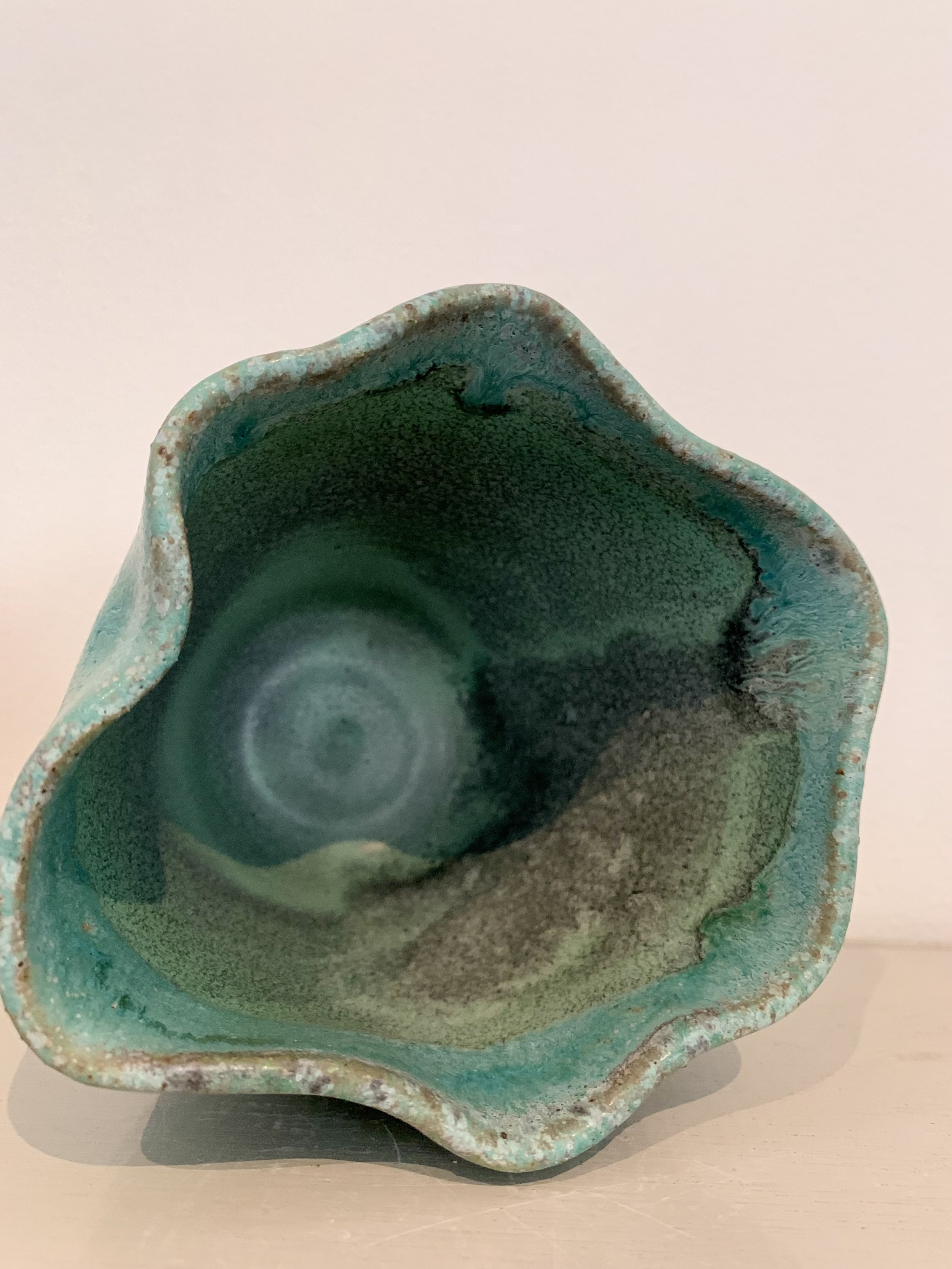 Thrown and altered bronzed green stoneware vase