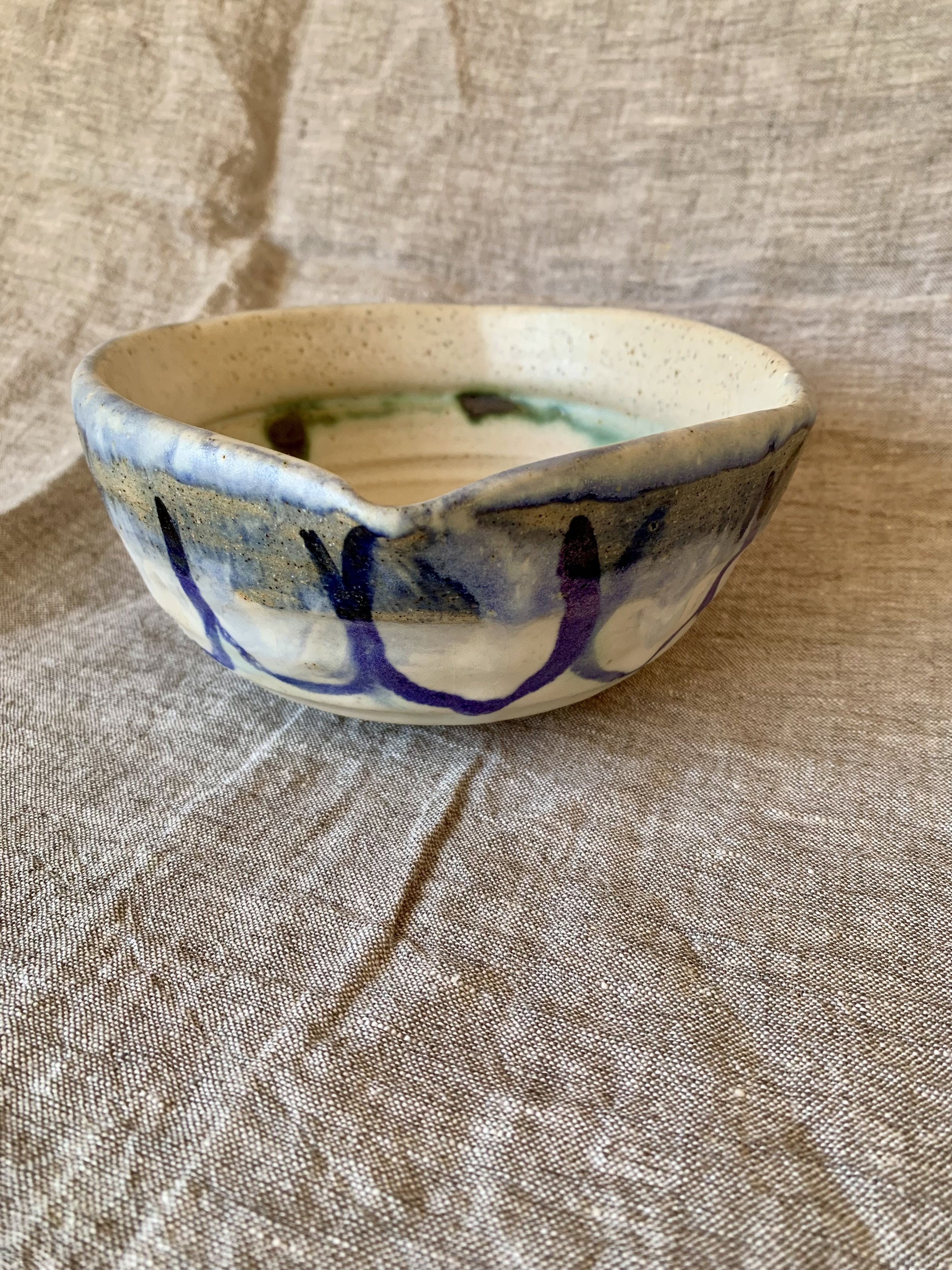 Bowl, stoneware with slips, oxides, and glaze.