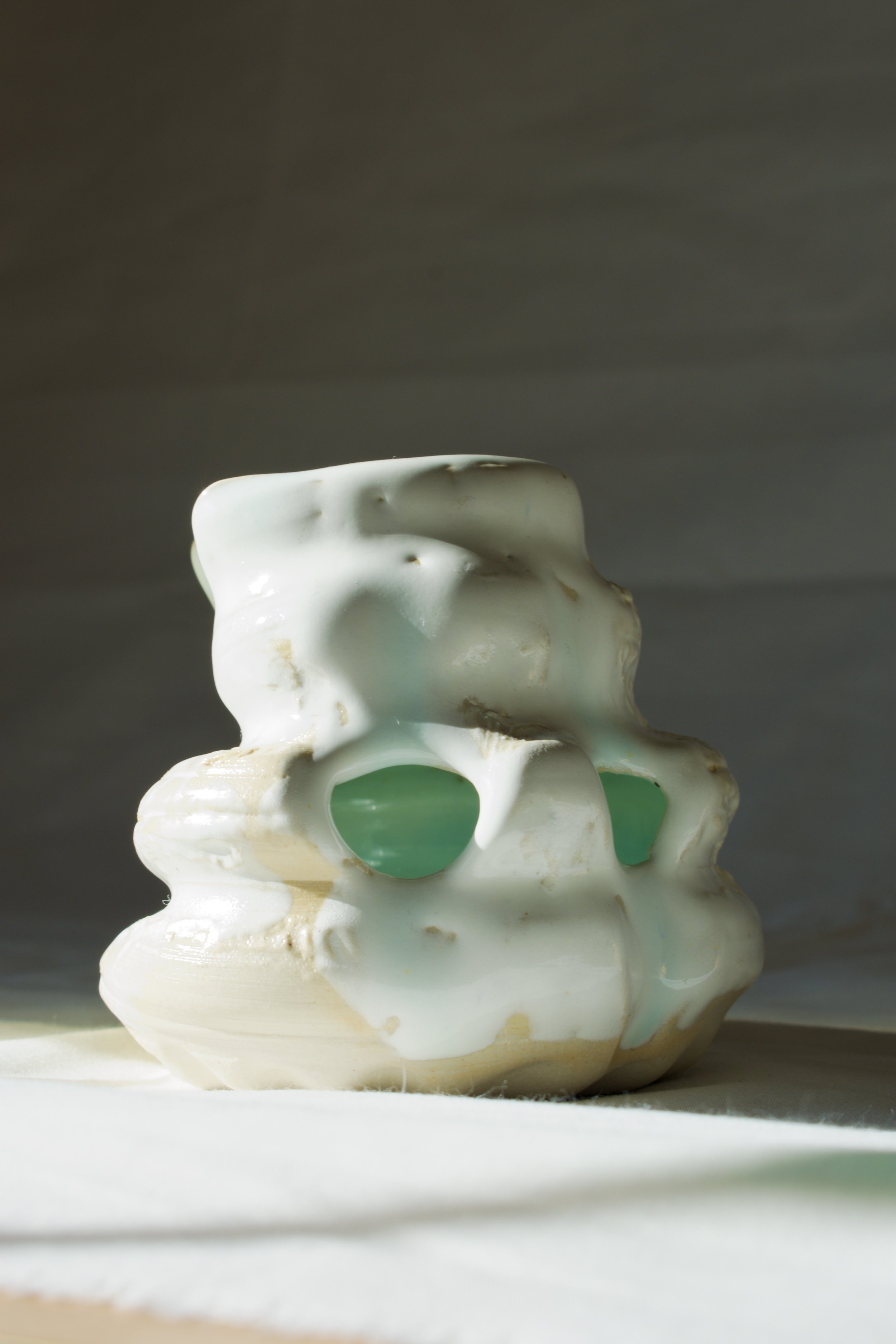 Erosion, 2025. Thrown and altered stoneware with layered slips, engobes, oxides, and glazes.