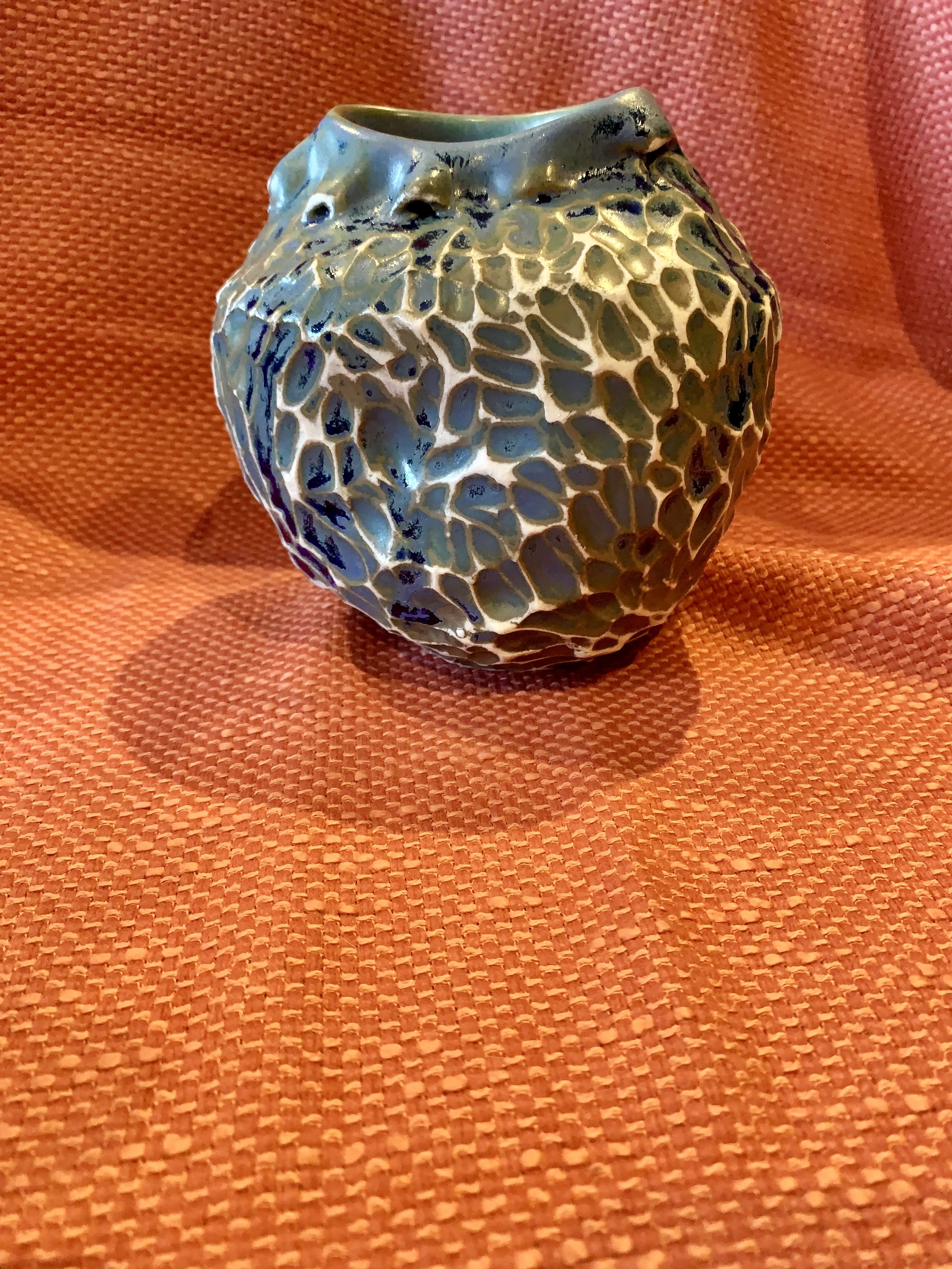 Frill necked and softly faceted thrown and altered vase, glazed stoneware