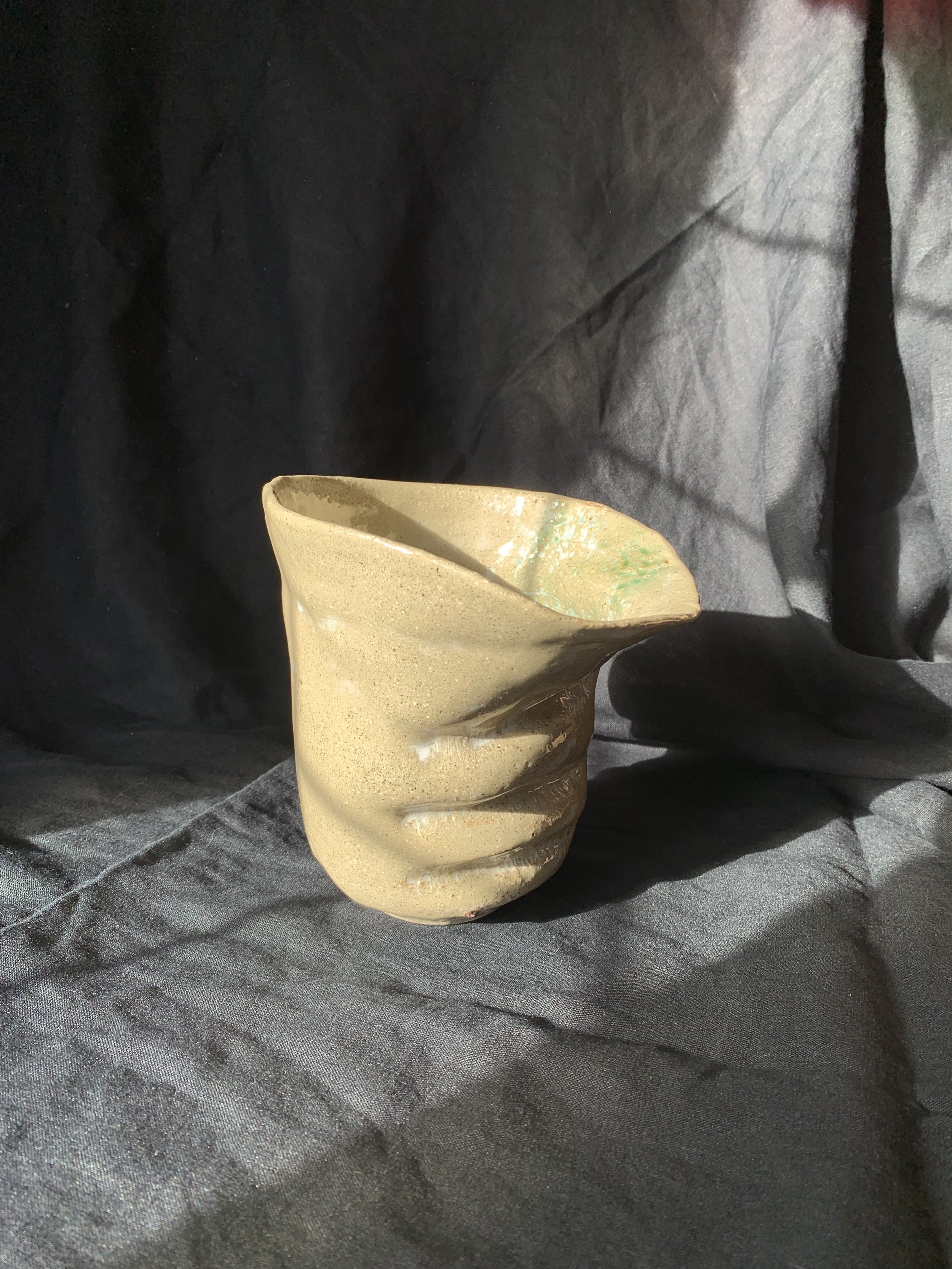 Sand and glass, 2025. Thrown and altered stoneware with layered slips, oxides, and glaze