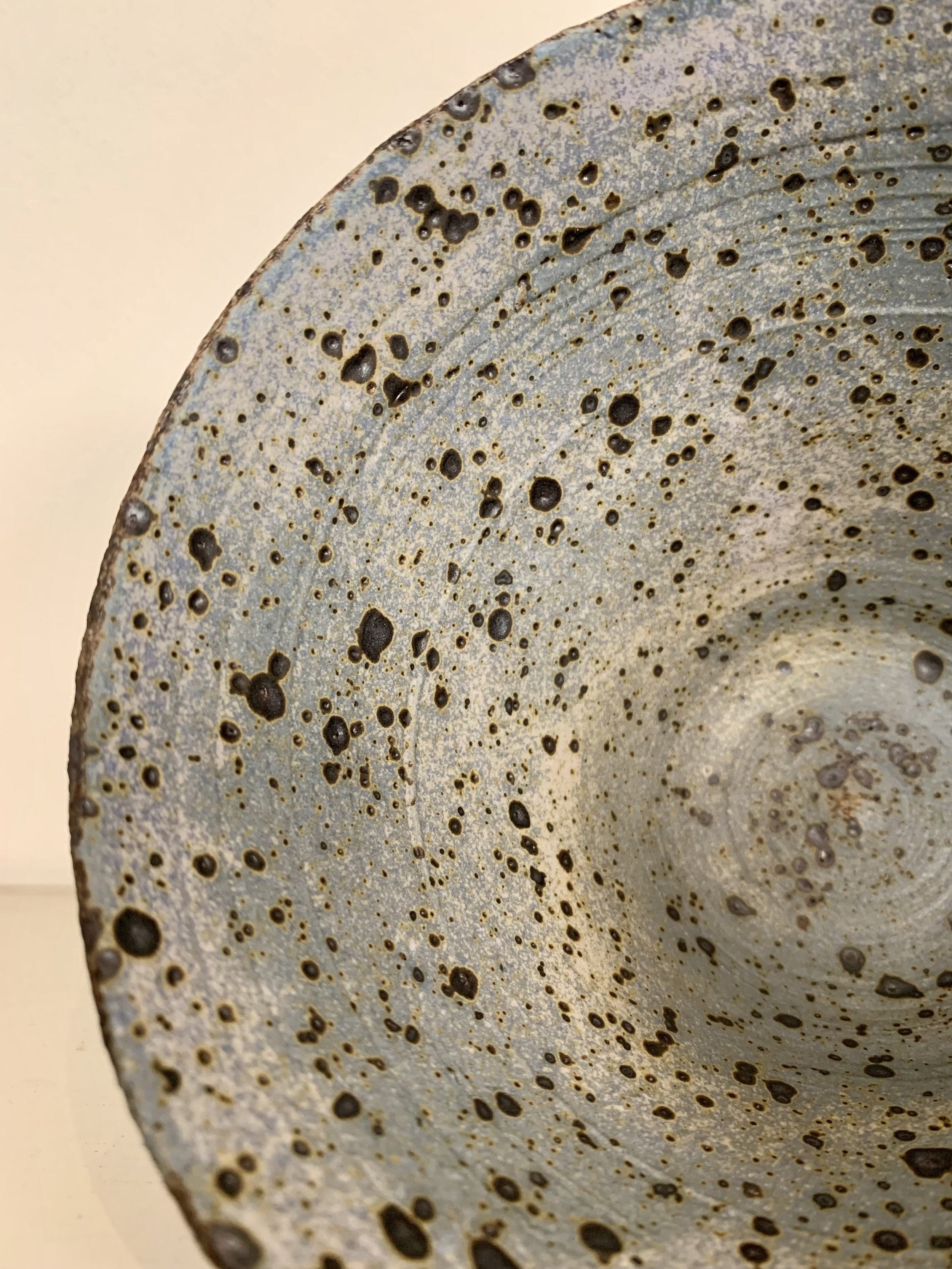 Detail of medium footed bowl, reduction fired stoneware