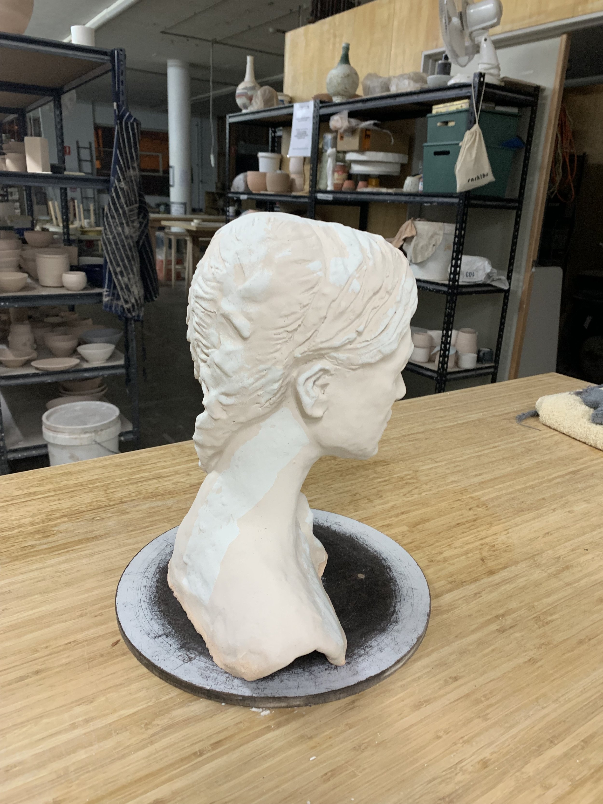 Bust in progress, glazed but not fired, 2025, Raku clay