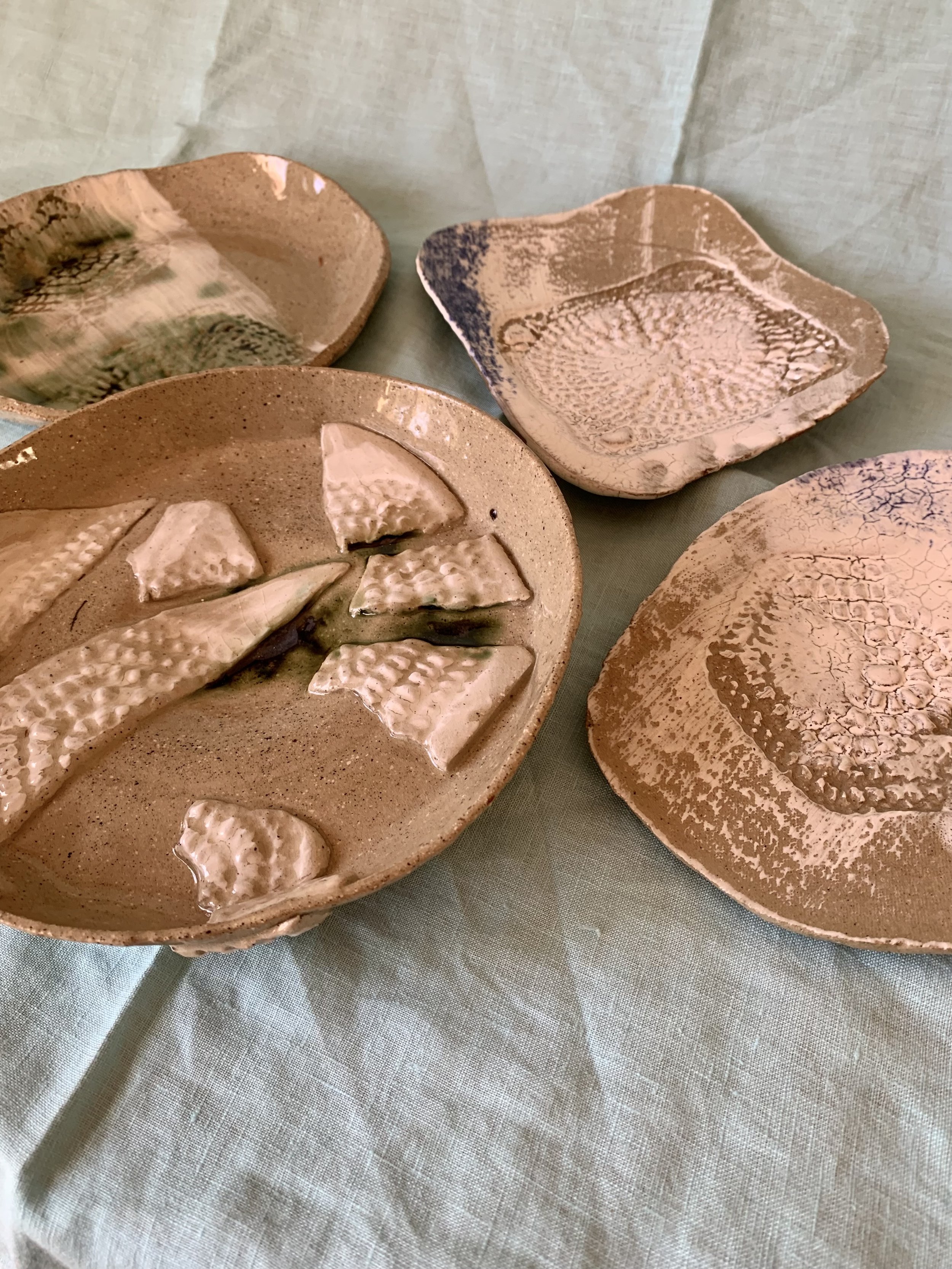 Slip-decorated stoneware serving dishes