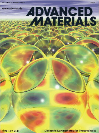 Light absorption enhancement in thin film solar cells using whispering gallery modes in dielectric nanospheres