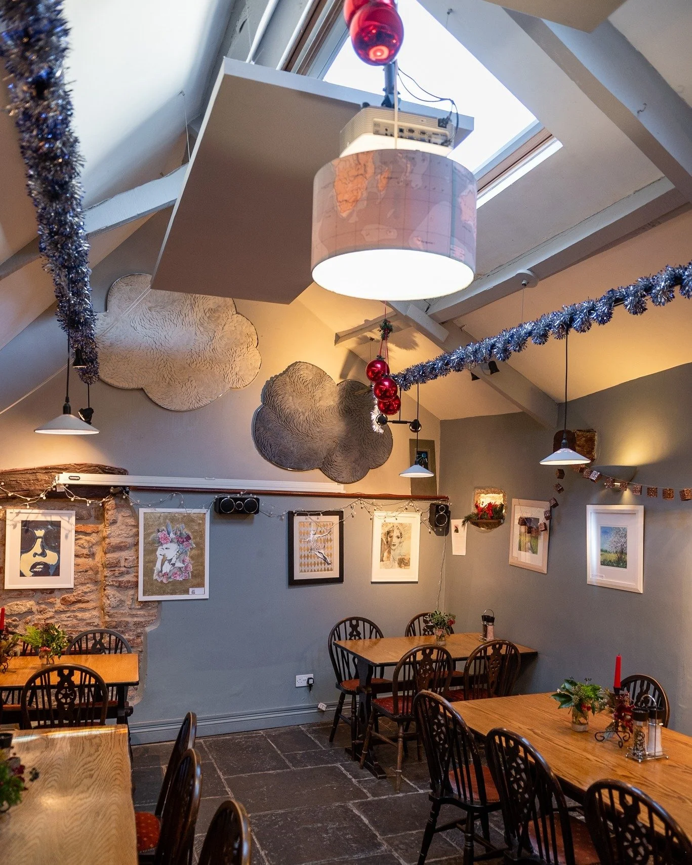 A recent installation of two bespoke grey, fabric-wrapped acoustic panels in a section of The George Inn in Croscombe, Somerset. Even in this small but lively space, echo and reverberation were a real challenge.

These custom sized absorbers were sus