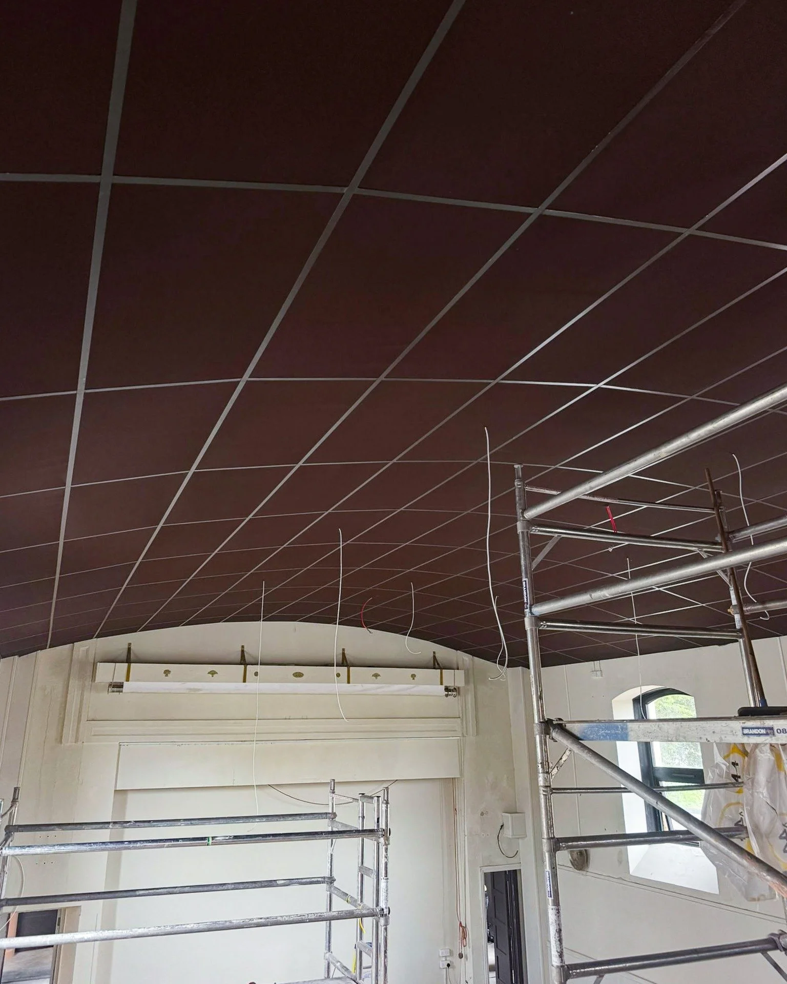Armstrong Hall | Update 

After careful consideration of the new ceiling at Armstrong Hall, the architect and project team chose to honour elements of the hall&rsquo;s historic and grand character by adapting the colour of the suspended ceiling grid 