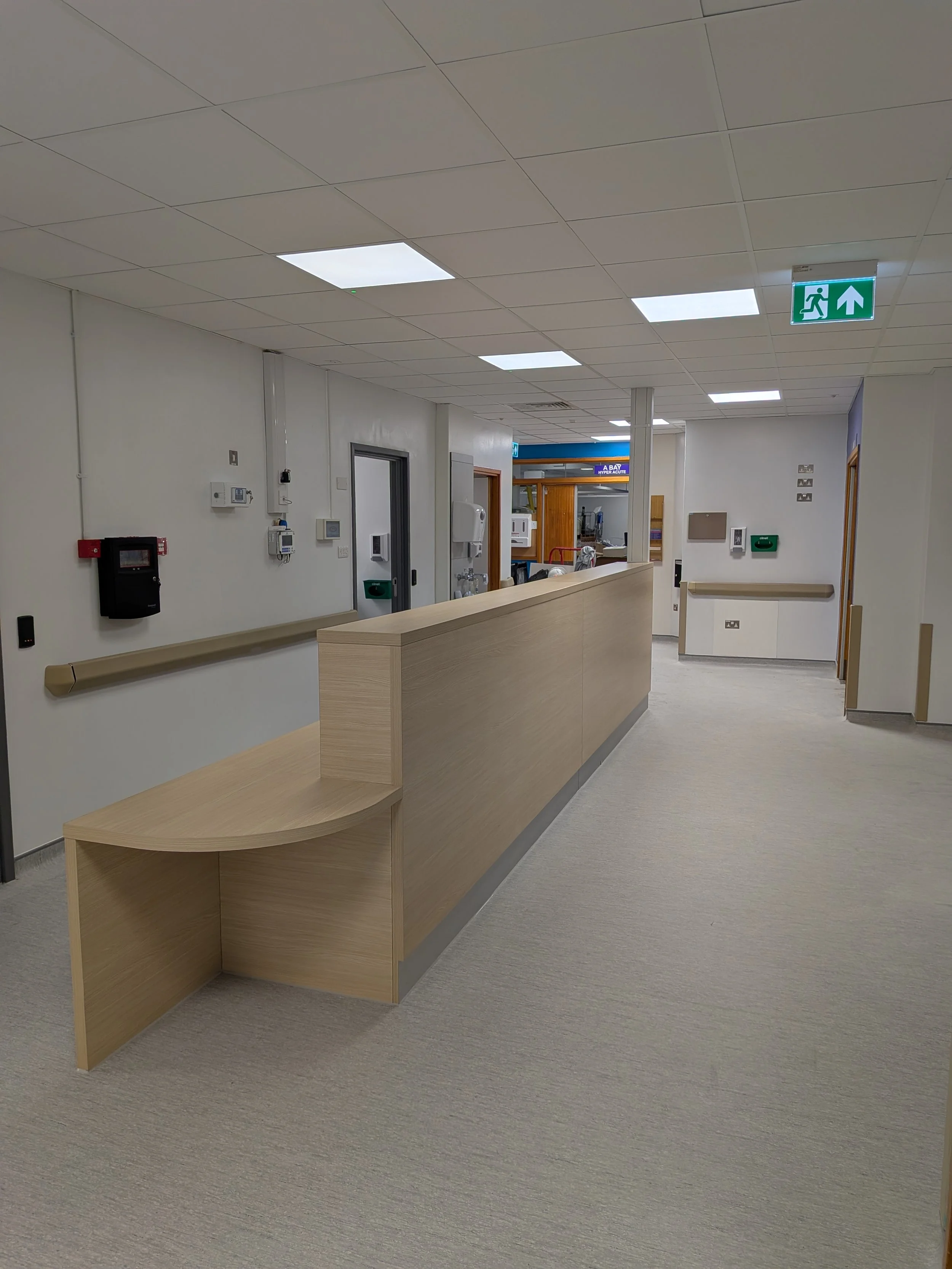 Hospital Entrance with Wooden Desk and Suspended ceiling.jpg