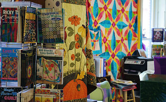 Quilts at the Marshall House is a large store dedicated to helping customers choose the best combination of fabrics for their project. They have more than 4000 bolts of quilting fabric, specializing in Asian, Batik, and 19th century reproduction fabrics.