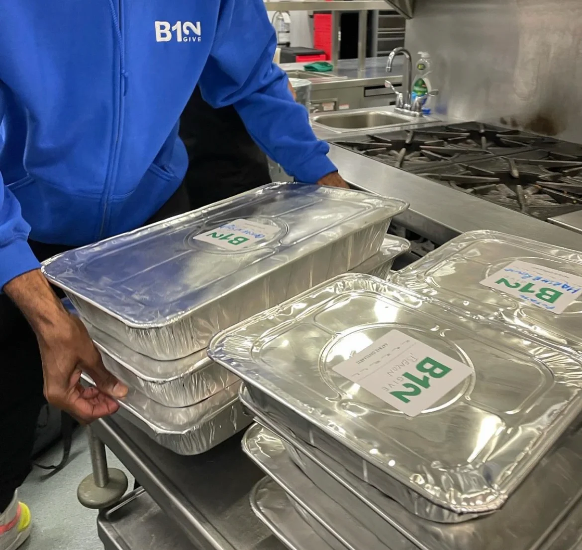 Leftover food is packaged from catered events in Toronto