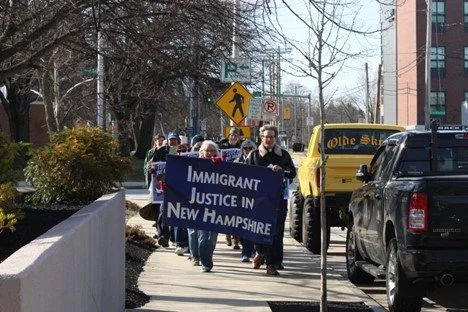 Faith communities at a vigil in downtown Manchester.