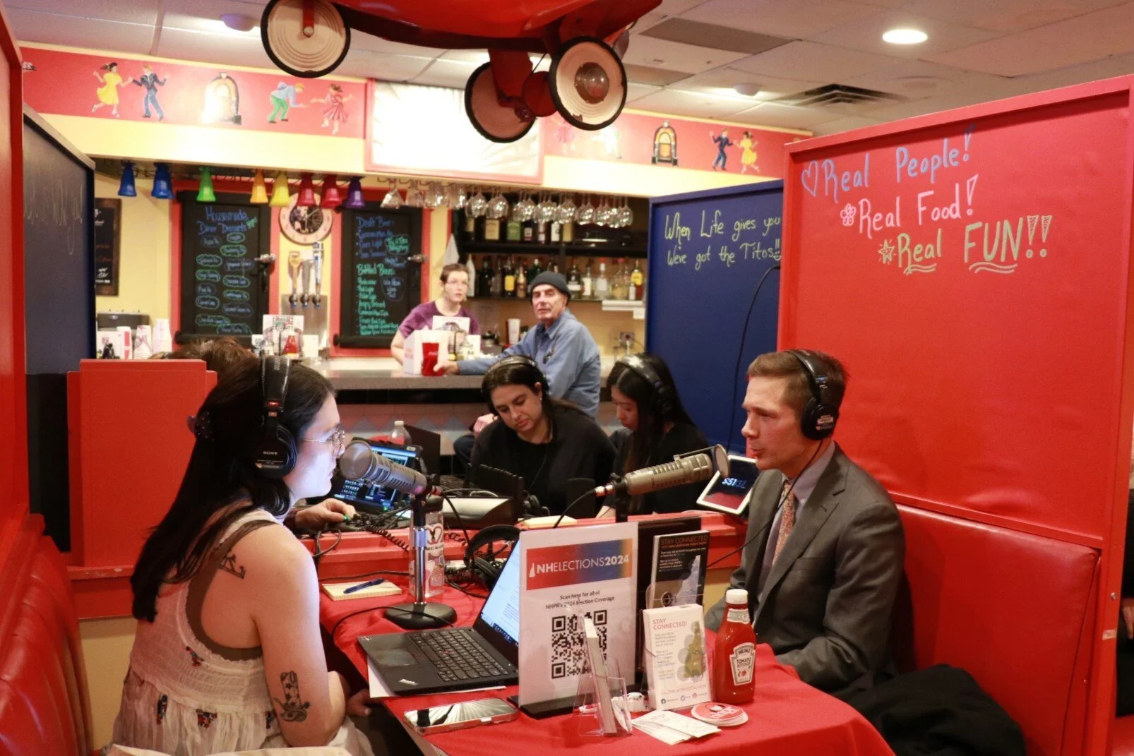 Host Julia Furukawa conducting a live interview from the Tilton Diner.