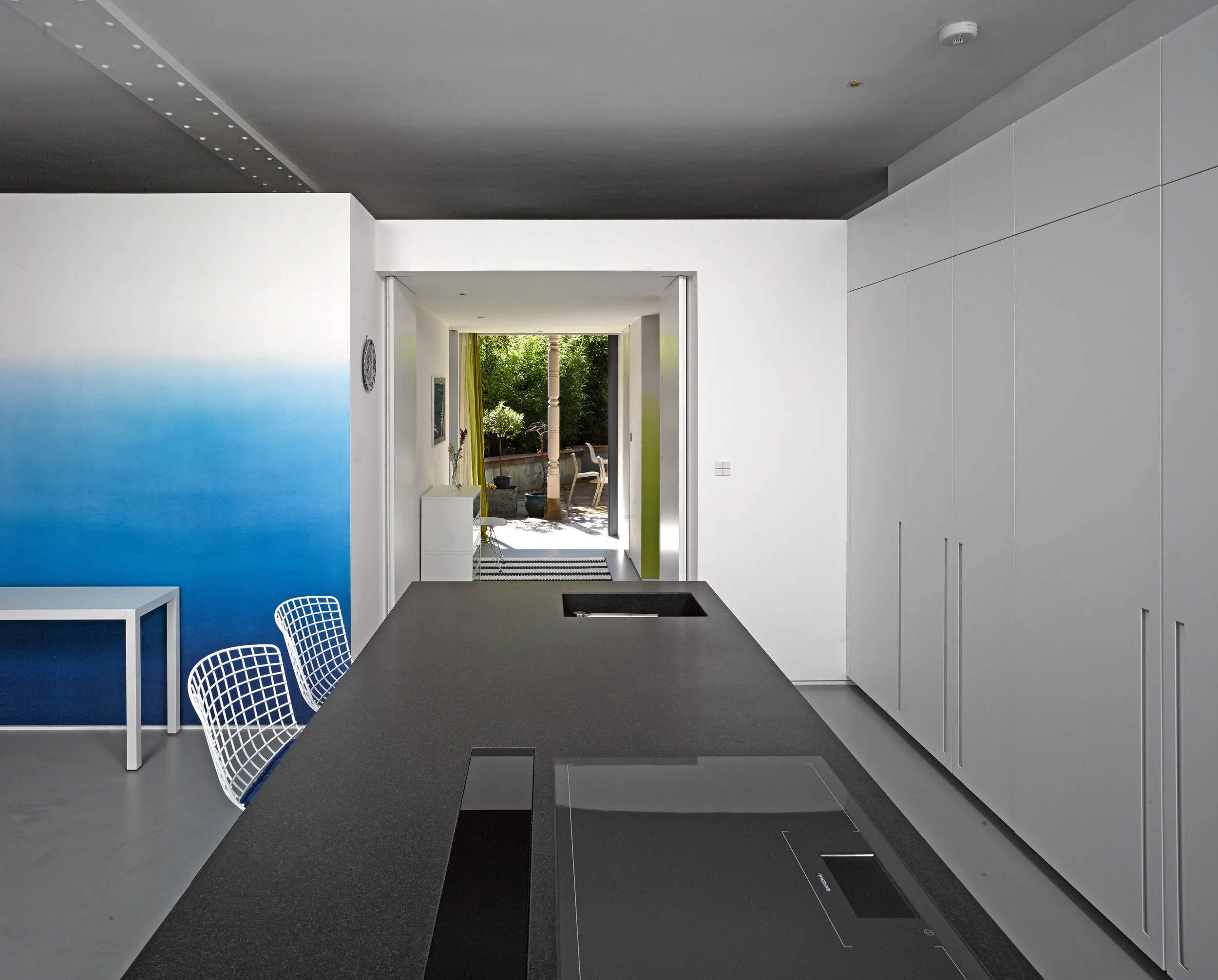 Open plan kitchen design in London. Find an Architect in London. Clever storage ideas for modern kitchen.