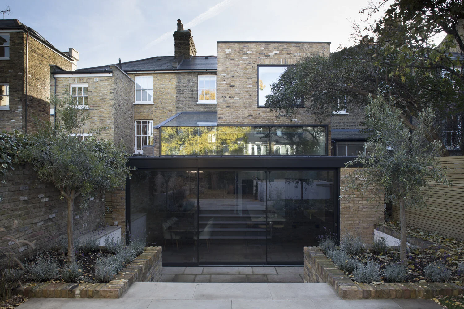 The base was extended and linked imaginatively to the ground and first floors