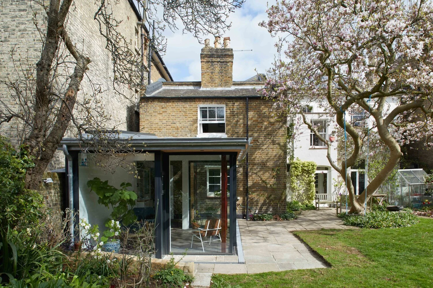 small garden room extension allows home owner to enjoy their garden in all seasons