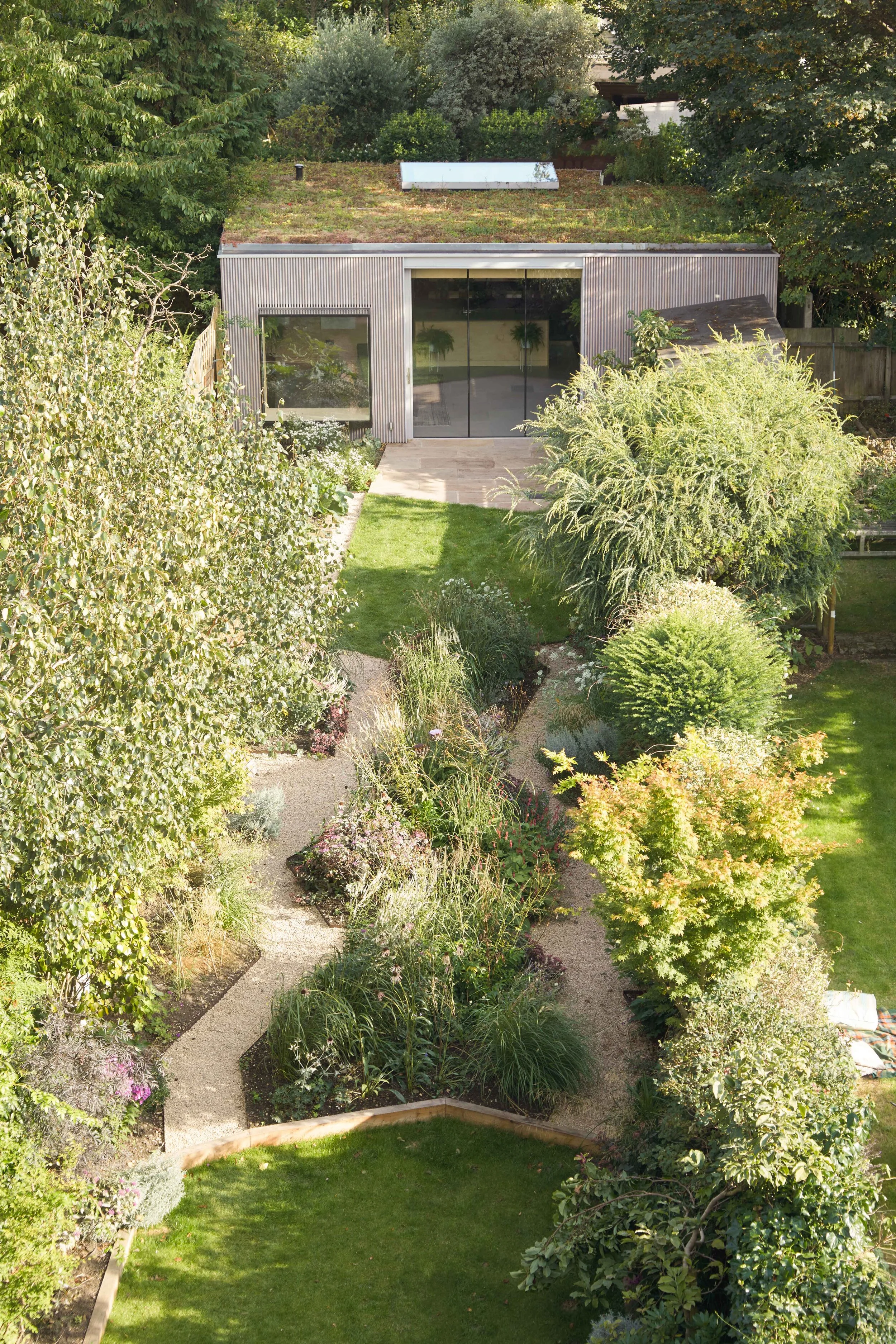 Aerial shot of London annex. Architects in London use timber to create garden home.