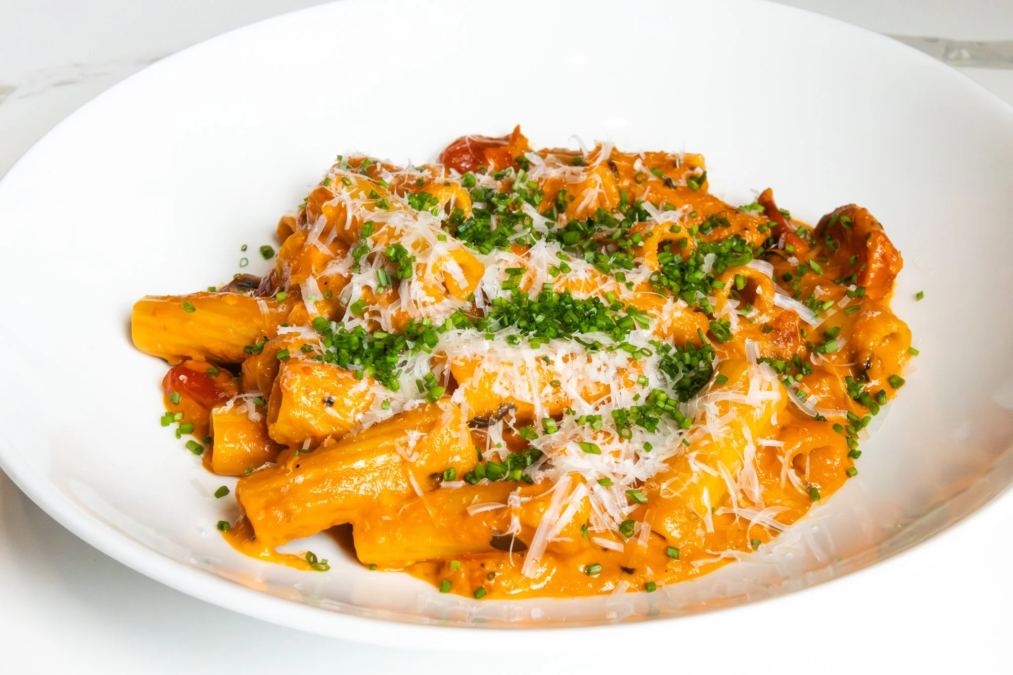 Celebrate National Pasta Day with us at Barrel & Derrick! Indulge in our amazing Spicy Rigatoni Alla Vodka, crafted with locally sourced, stone-milled Bordo pasta, creamy ricotta, rich Parmesan Reggiano, and vibrant fresh basil. It's a flavor adv