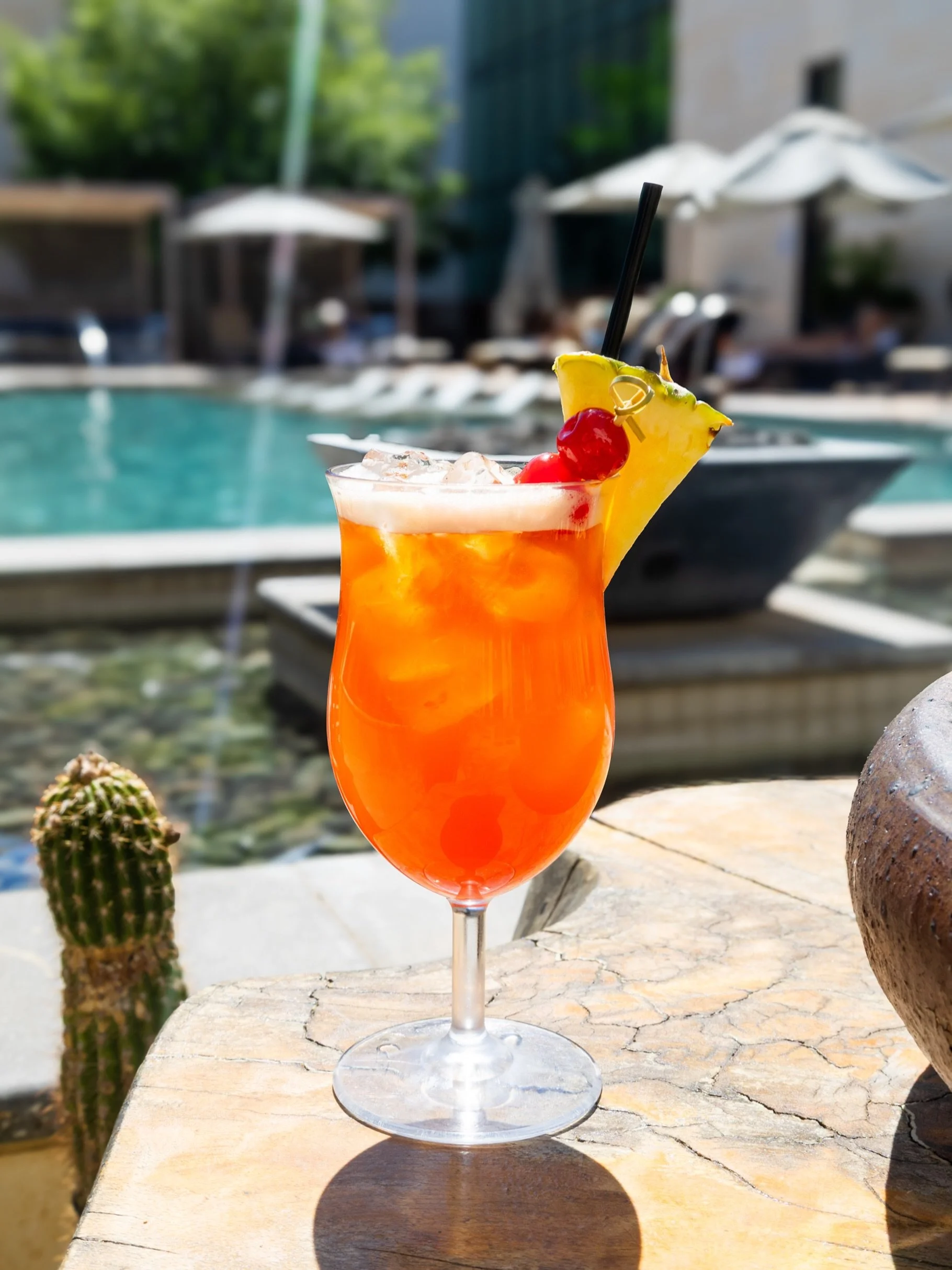 Give yourself the relaxation you deserve poolside with a White Buffalo specialty cocktail 🍹