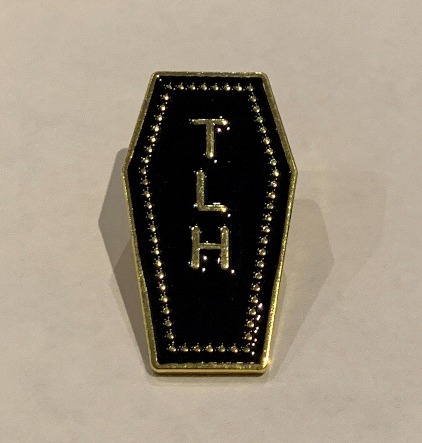 THE COFFIN PIN