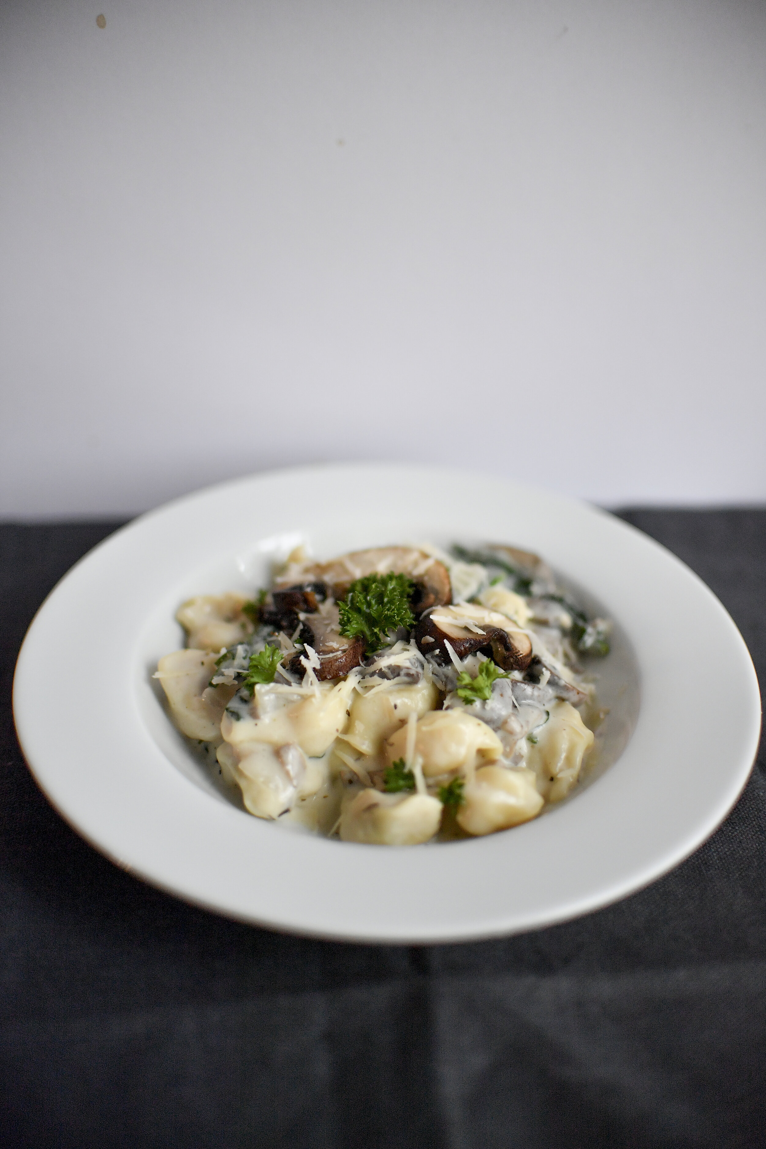 Creamy Asiago-Parmesan Tortellini with Spinach and Mushrooms 