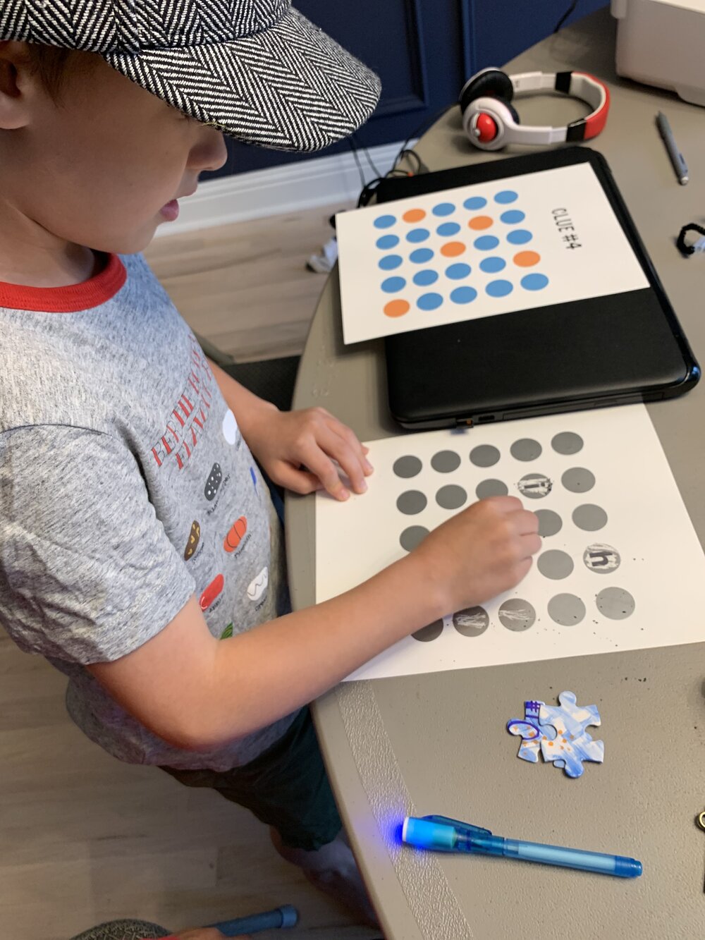  Scratch off stickers and a pattern clue to reveal a password. 