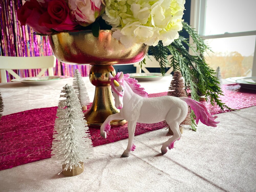  The sequin table runner was a fun addition to the table and added some contrast to the light pink tablecloth. 