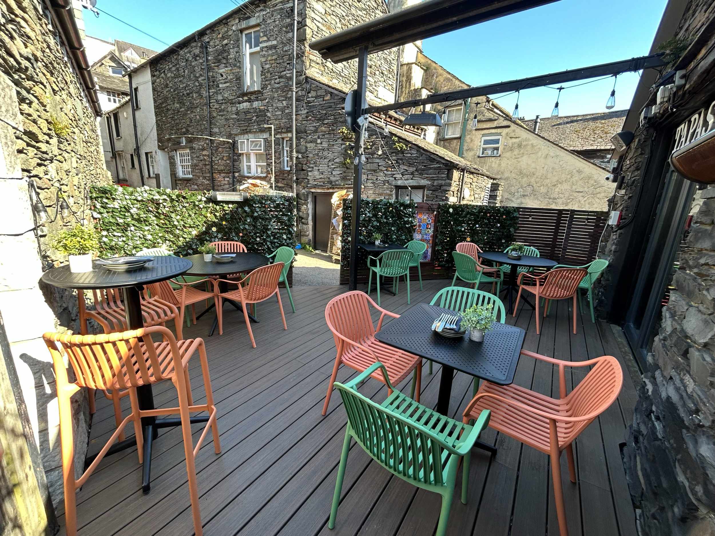 OUTSIDE WITH AWNING/HEATERS