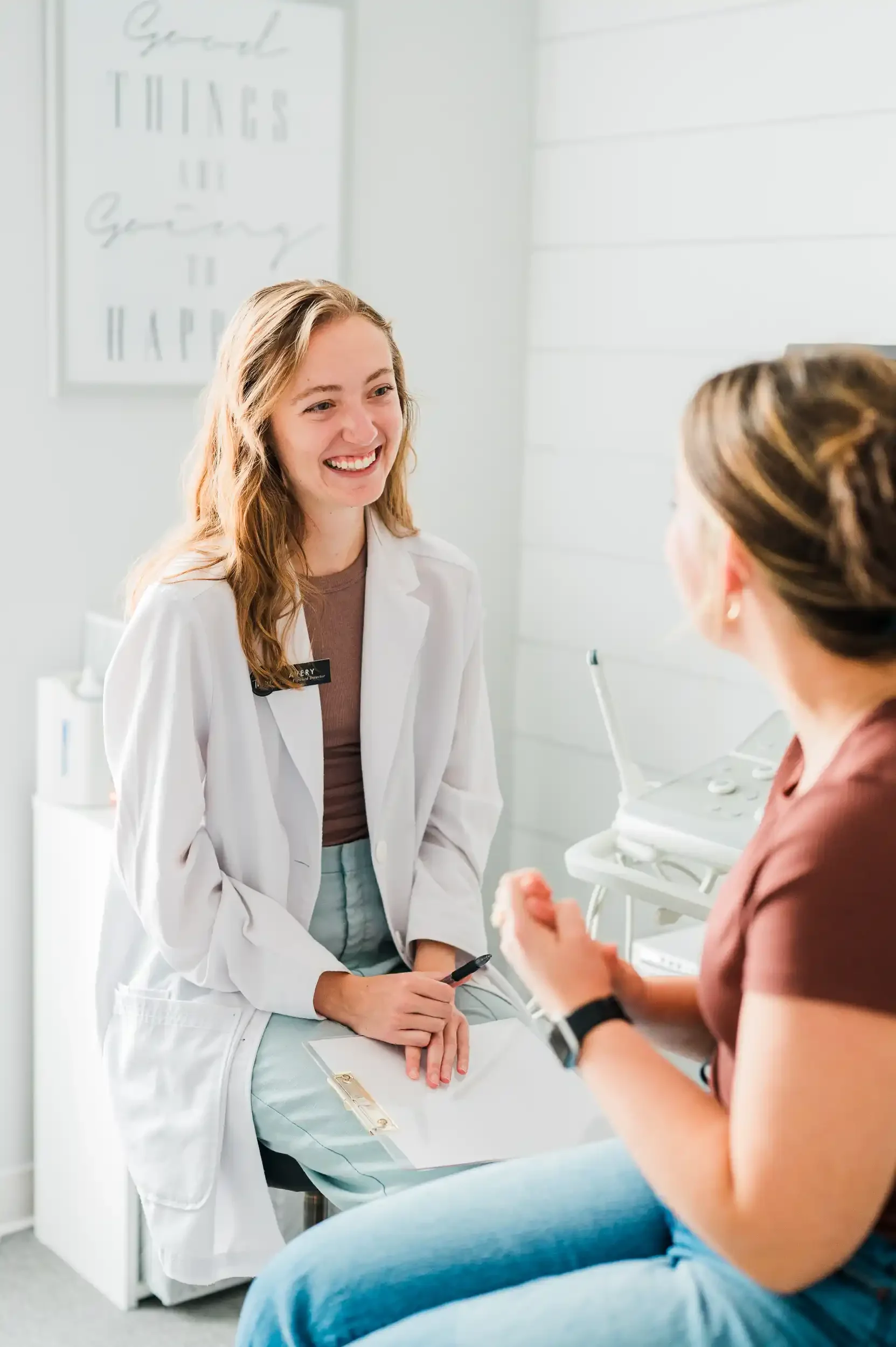 smiling medical team member meeting with patient