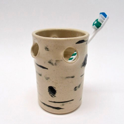 Nutfield Pottery Birch Line toothbrush holder Handcrafted by Michael Gibbons of Nutfield Pottery White stoneware with black slip decoration, depicting New Hampshire’s state tree.