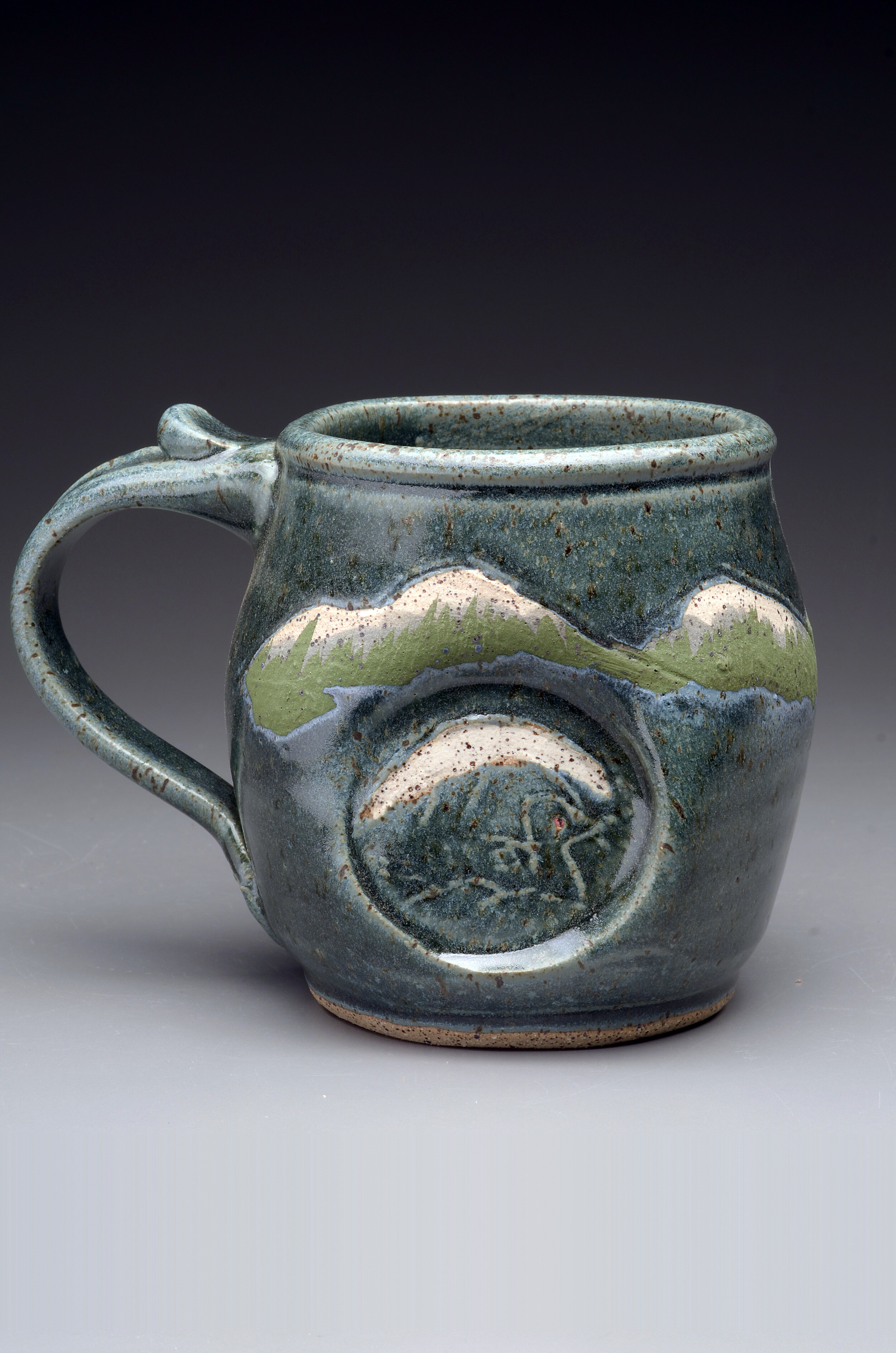 Mountain Pattern mug handcrafted by Michael Gibbons of Nutfield Pottery, Derry, NH, USA