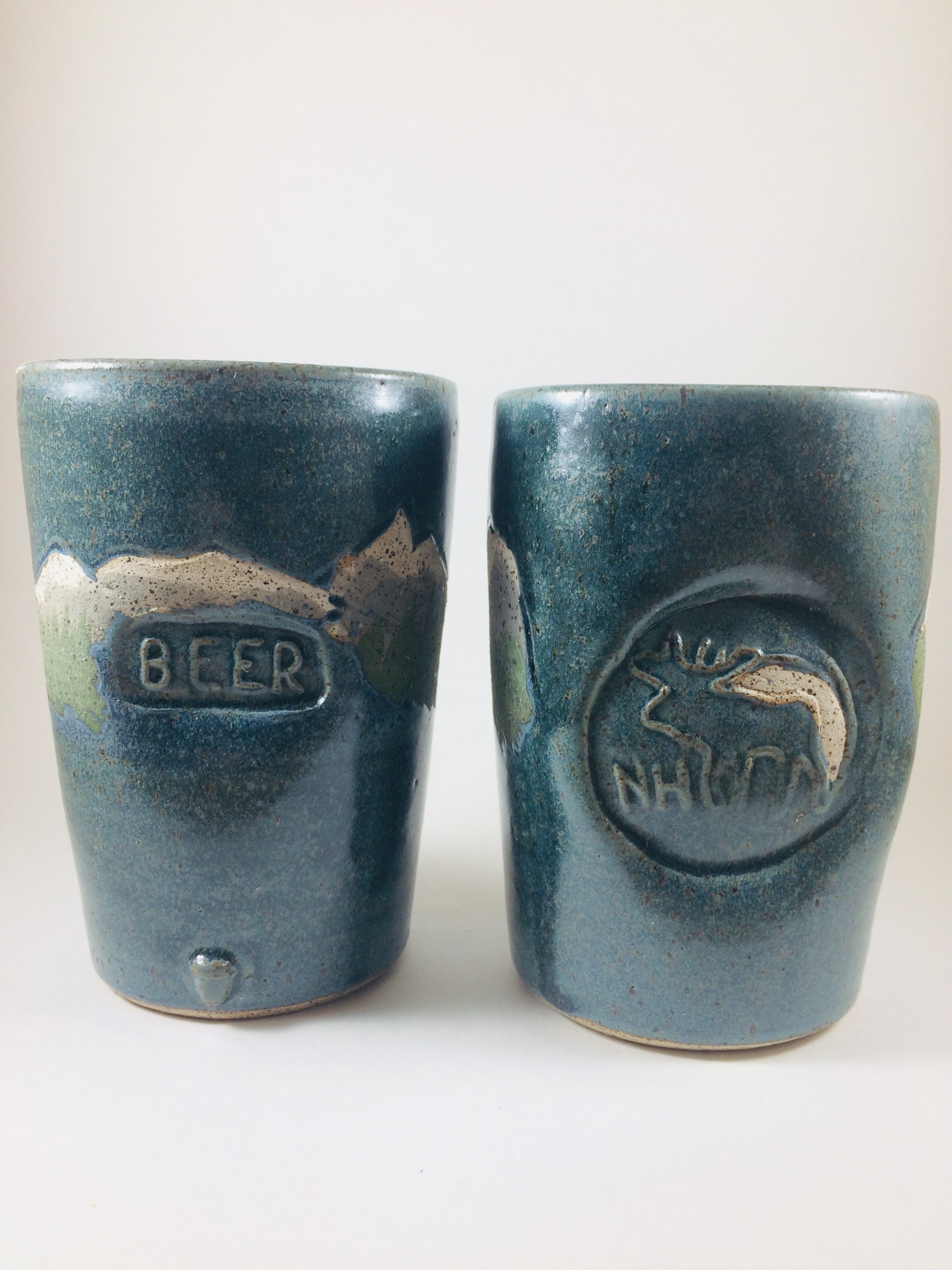 Mountain Pattern mugs handcrafted by Michael Gibbons of Nutfield Pottery, Derry, NH, USA