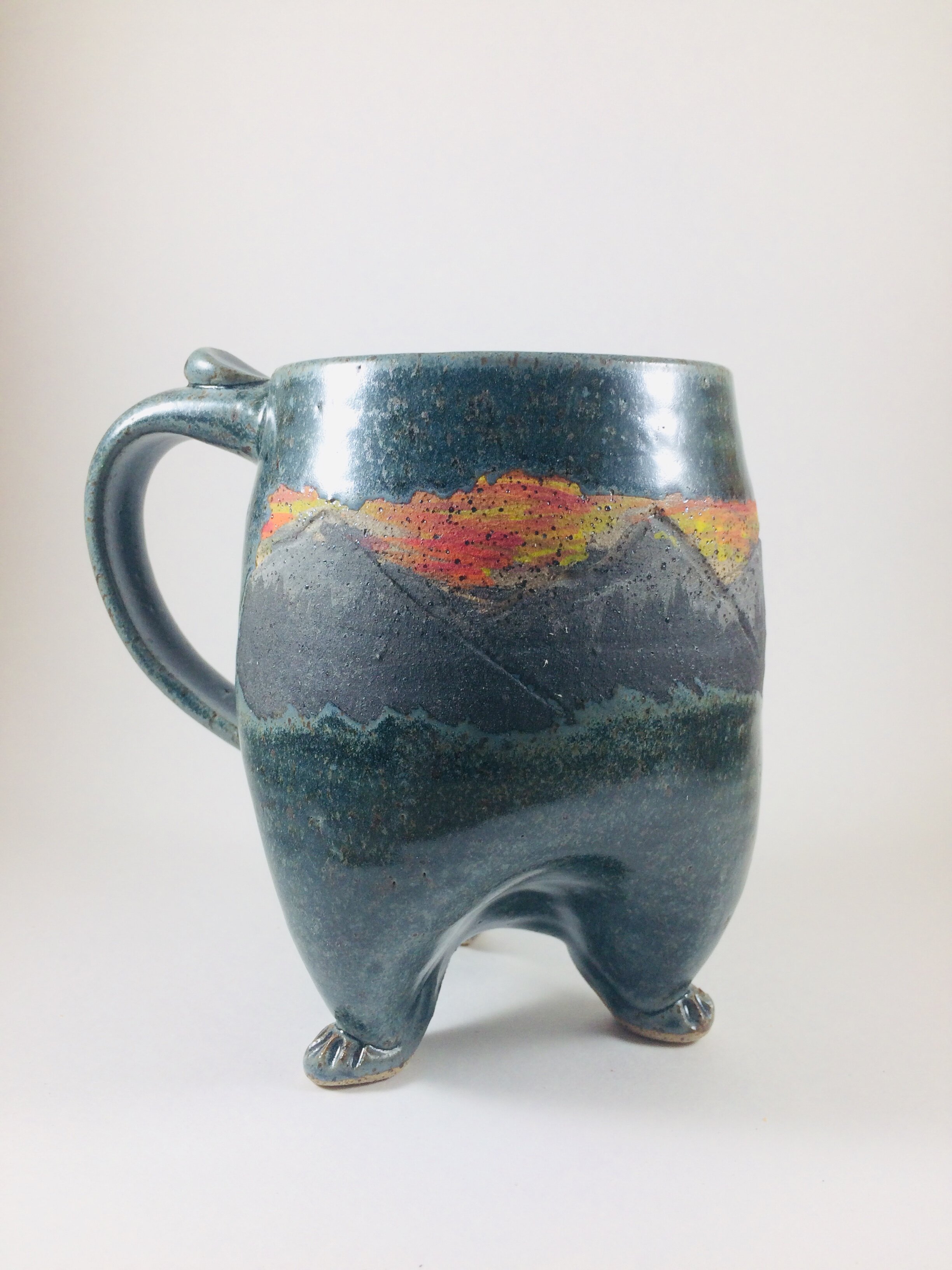 Mountain Pattern Footed Mug handcrafted by Michael Gibbons of Nutfield Pottery, Derry, NH, USA