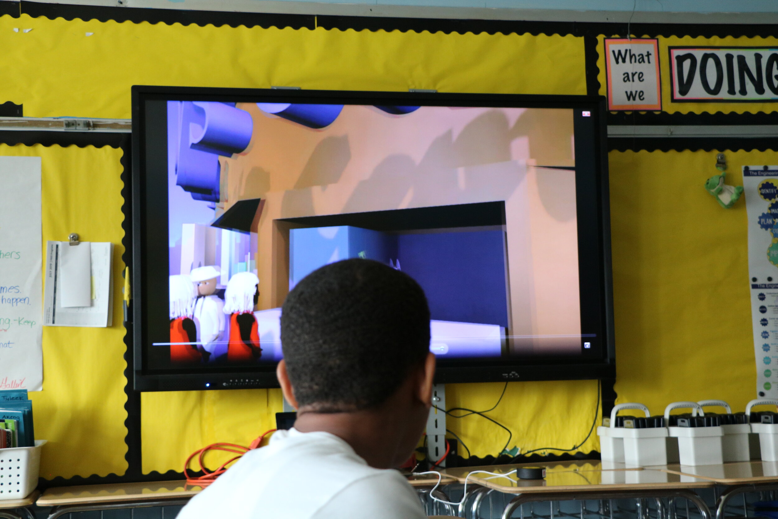A School Participant Screens His Animation