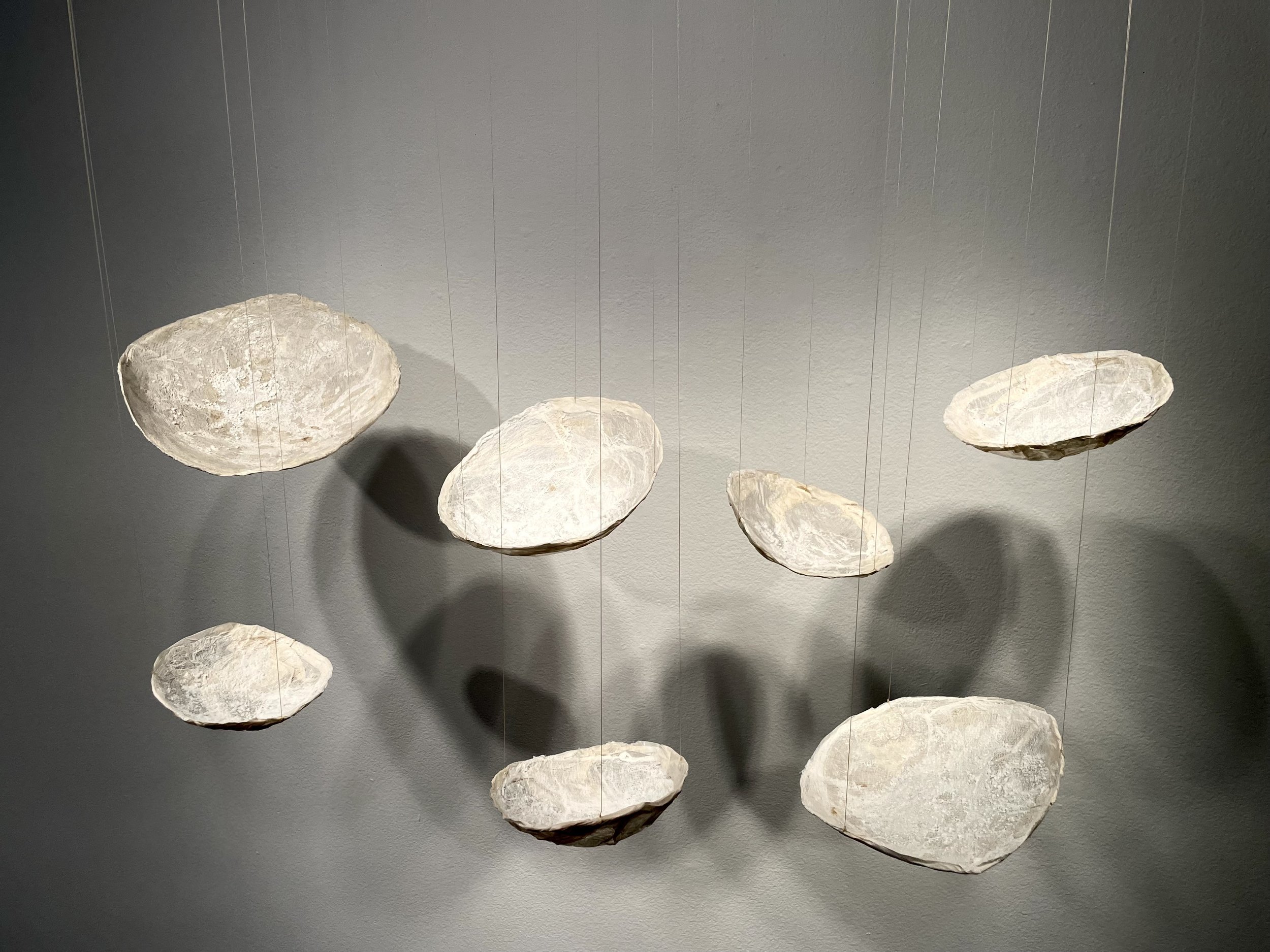 The repetitive forms and actions used within the work are meditative interventions in the space, seen as acts to heal or prayers.