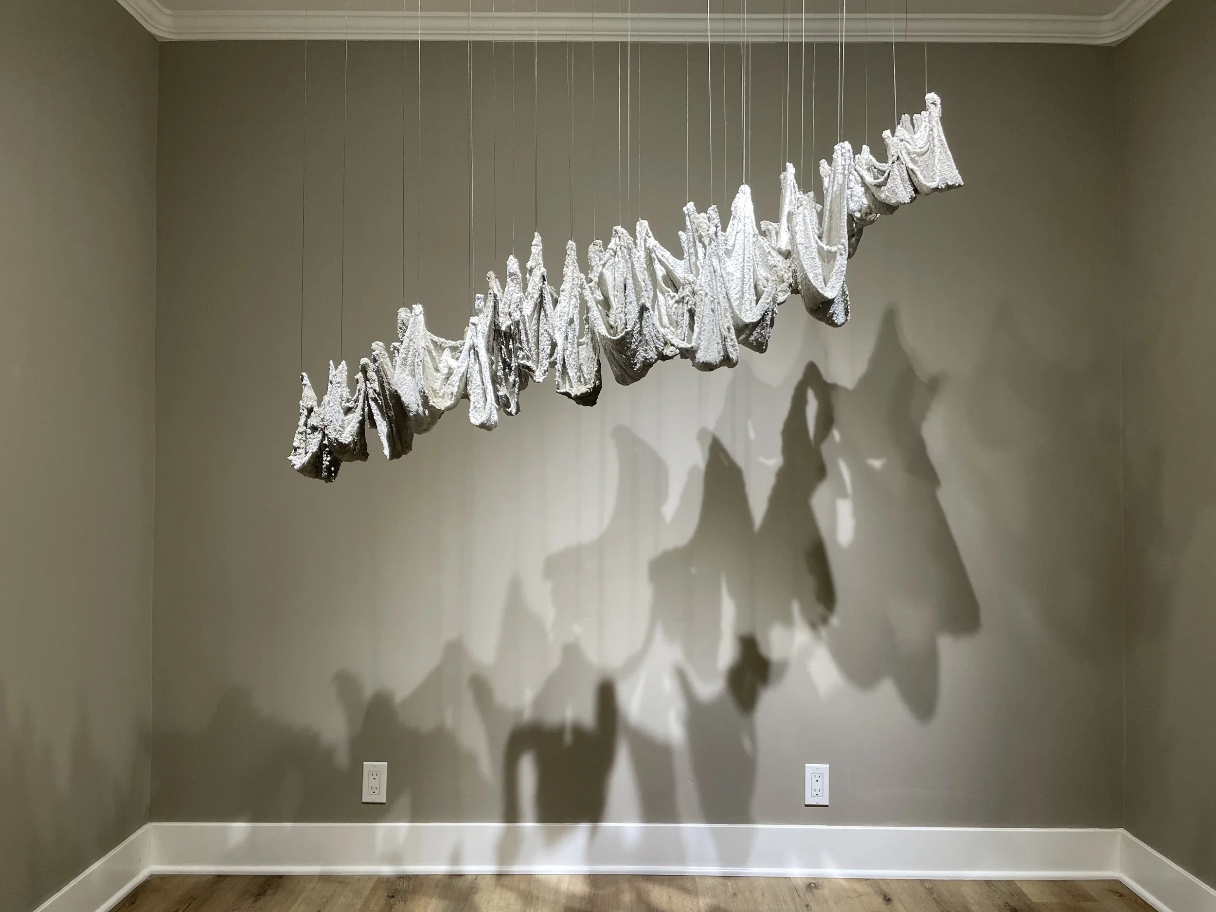 Holding Space , 2022, Concrete and fabric, 5’ x 4’ x 2’