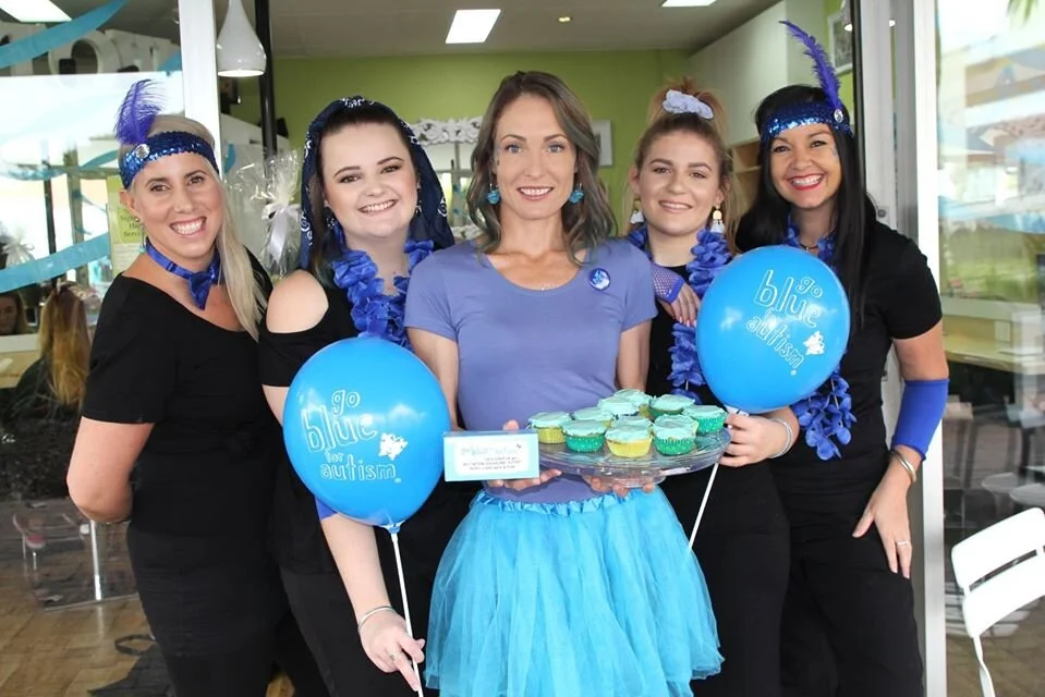 Uptown Hair staff wear blue for Autism Awareness