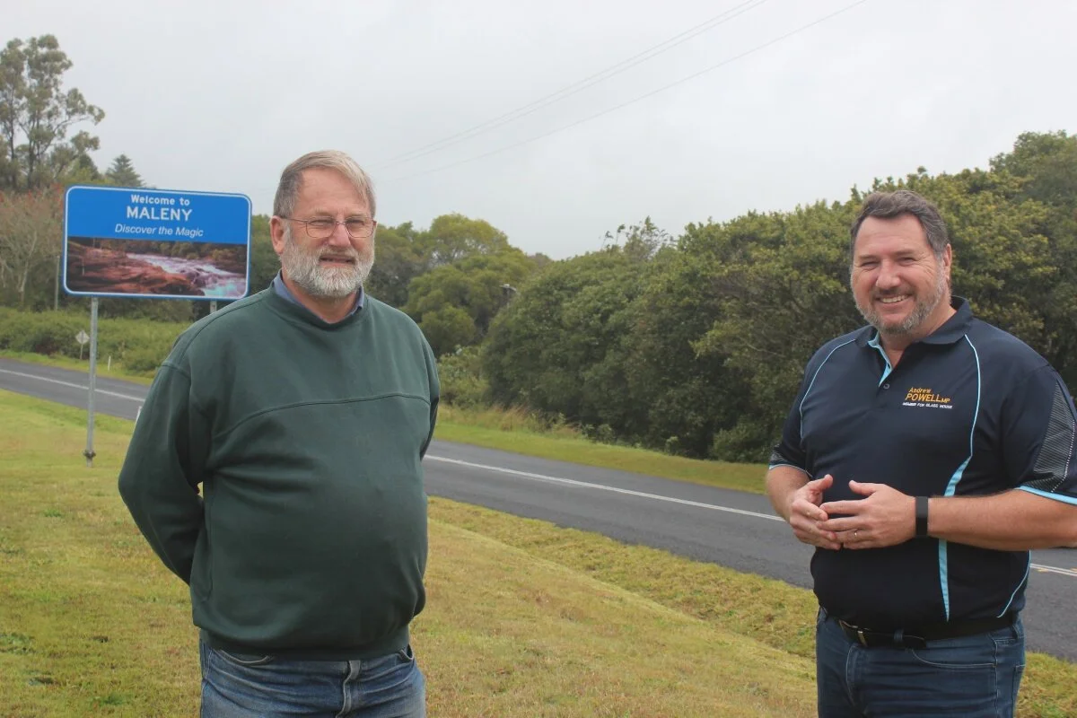 Andrew Powell, right, with Witta local Dennis Hensby at Maleny-Kenilworth Road.
