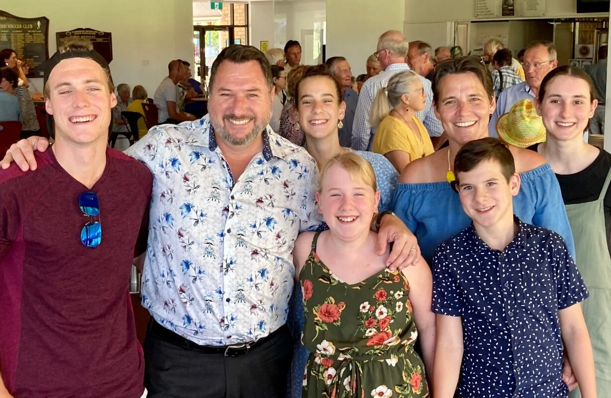 Powell celebrates with family