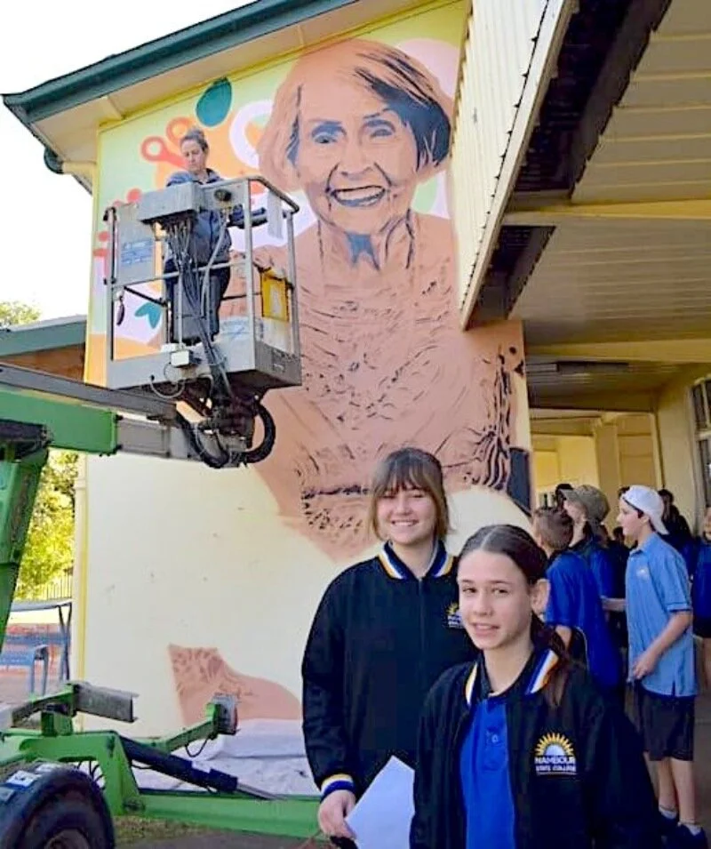 Students pitch in to help paint tribute to Maureen