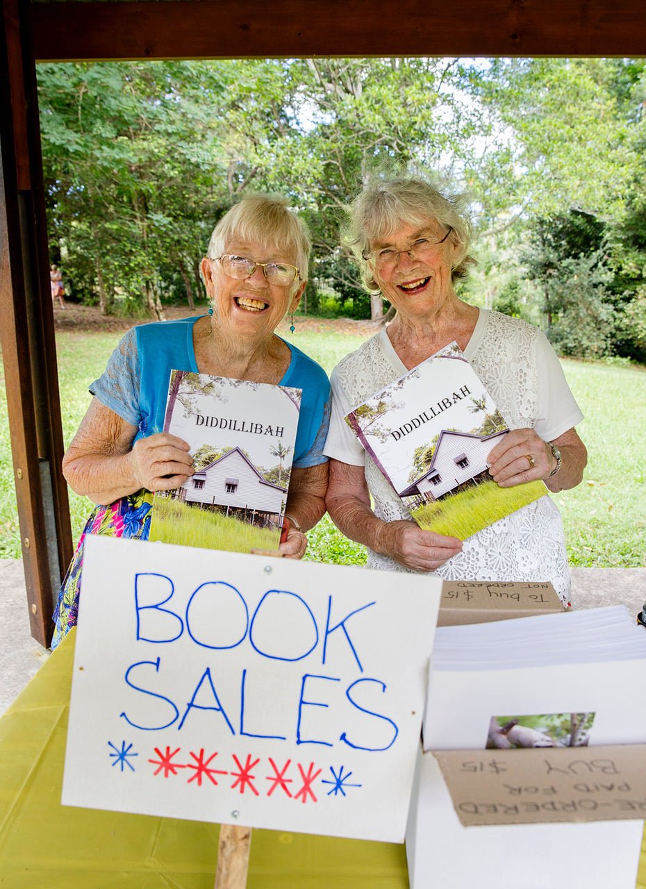 Volunteer Pat Atkinson assists Author Eunice Paulett with book sales Photo Marion Jonkers