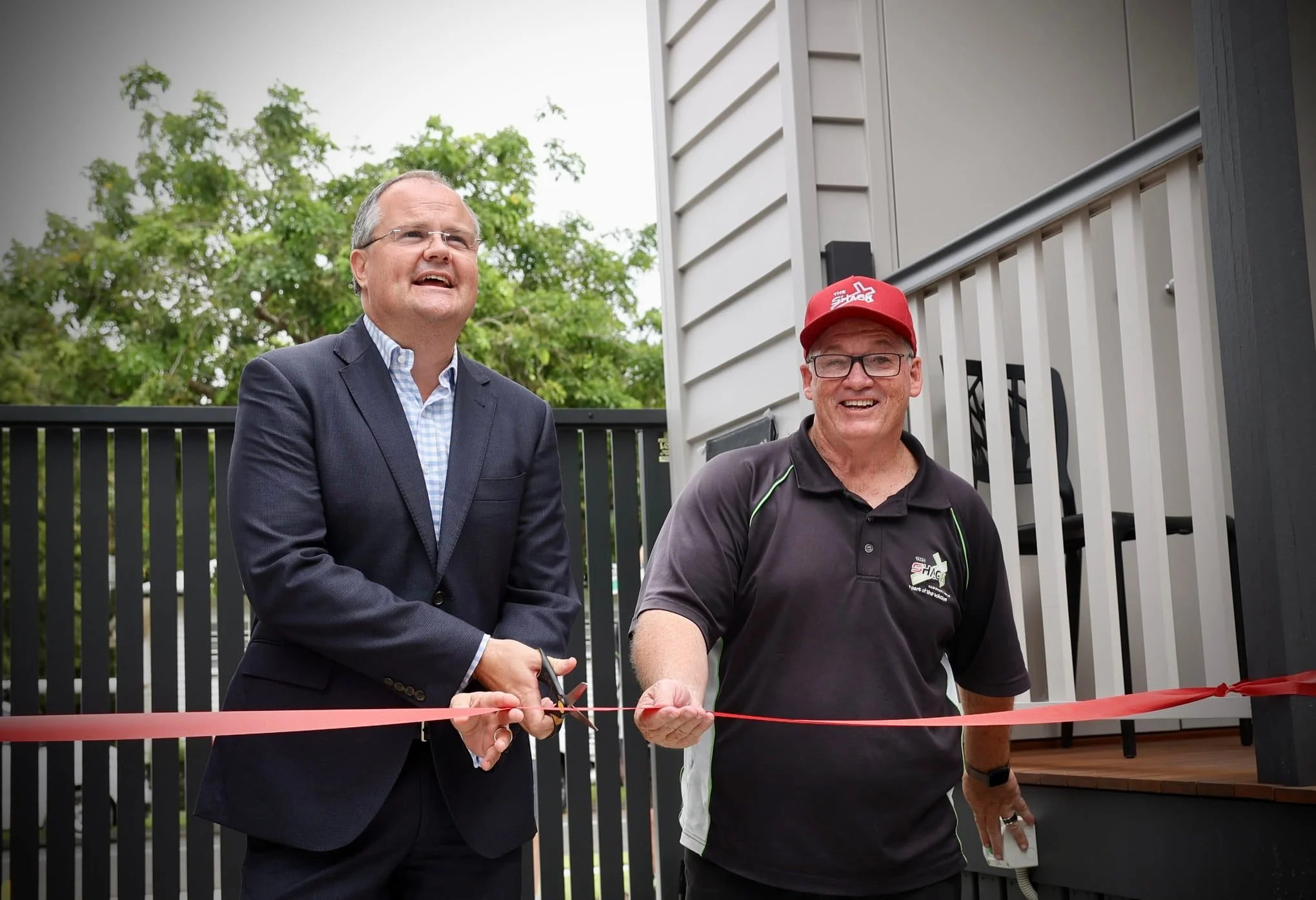  Ted O’Brien cuts the ribbon to officially open Gen One with Pastor Dale Dowler. 