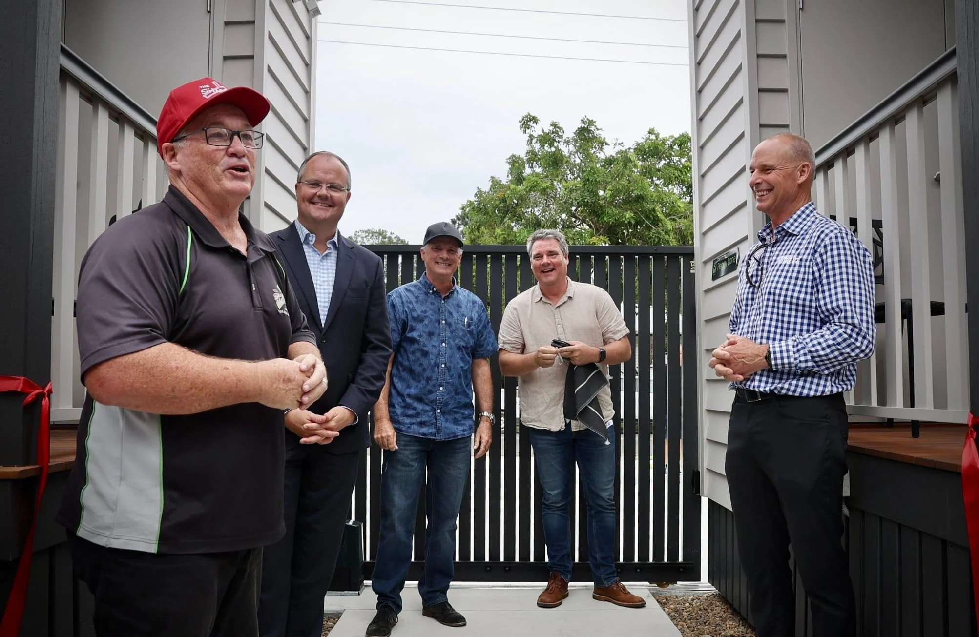  From left, Pastor Dale Dowler, Ted O'Brien and Paul, Luke and Tim Lanham, whose family donated the land for the project. 