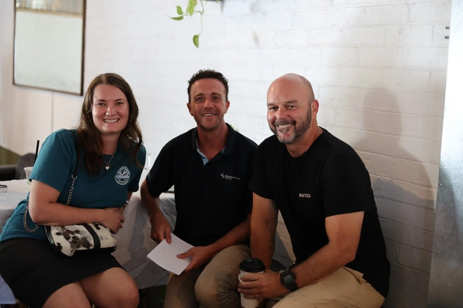 Emma Powter from Power Curve, Matty from Council’s Economic Development team and local swimming coach David Simon.