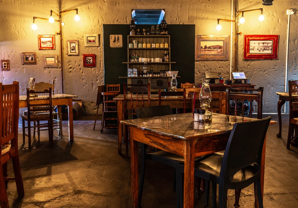 empty restaurant with mood lighting, tables and chairs in restaurant, interior photography, photo of restaurant.jpg