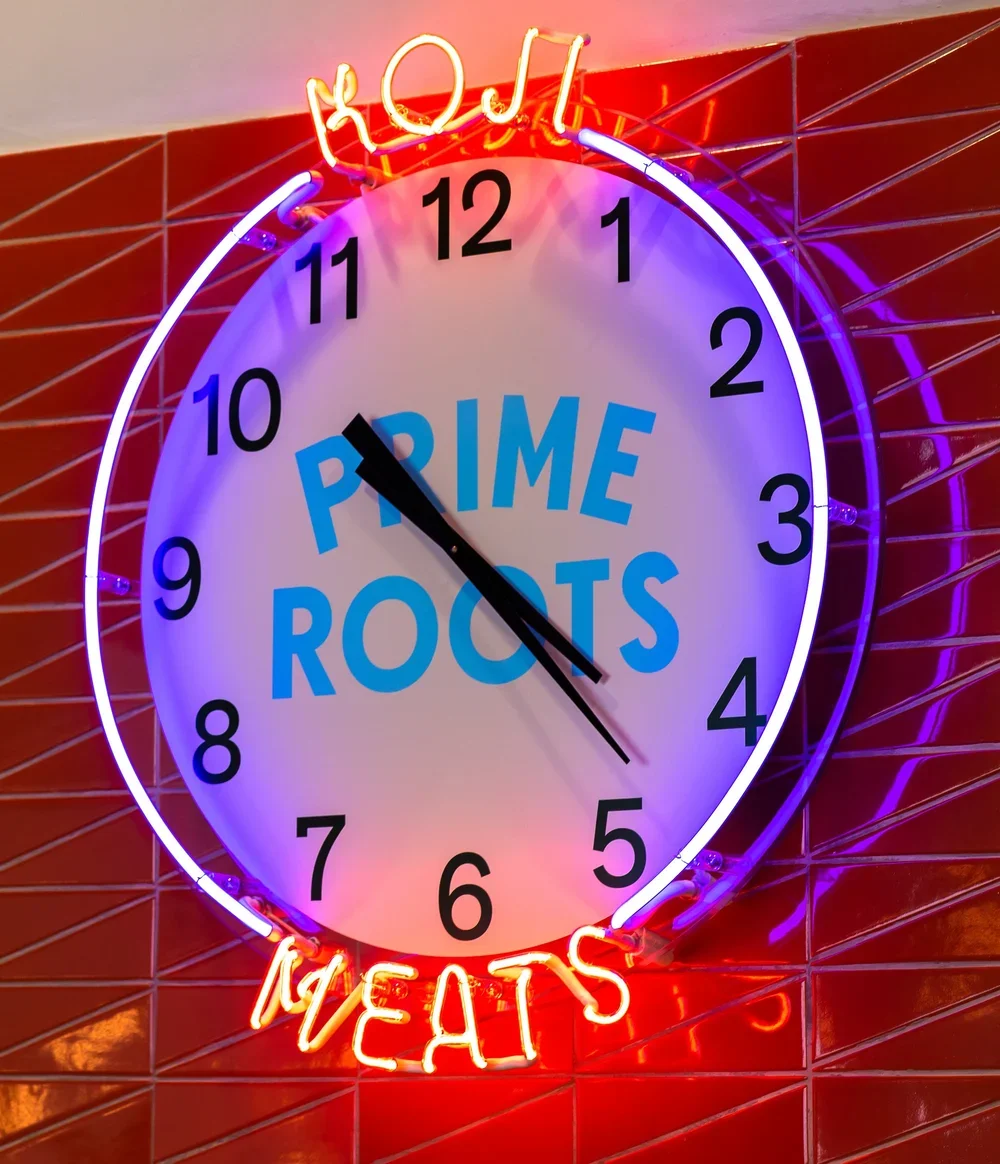 Ames made the neon for "Koji Meats" designed and installed by Artist Laura Stevenson
