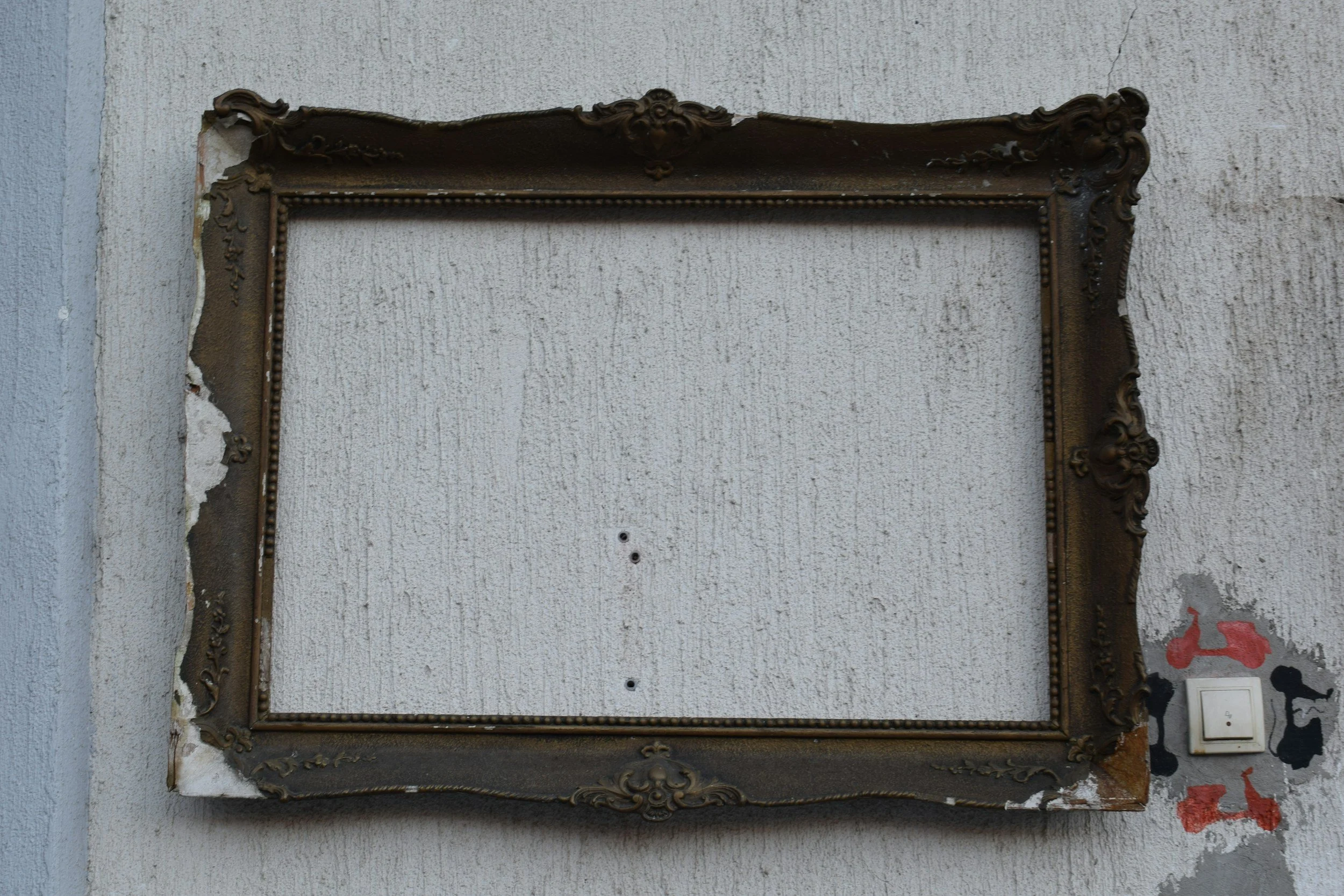 Empty frame, symbolizing ambiguous loss and mourning the relationship you thought you had because of infidelity, betrayal trauma